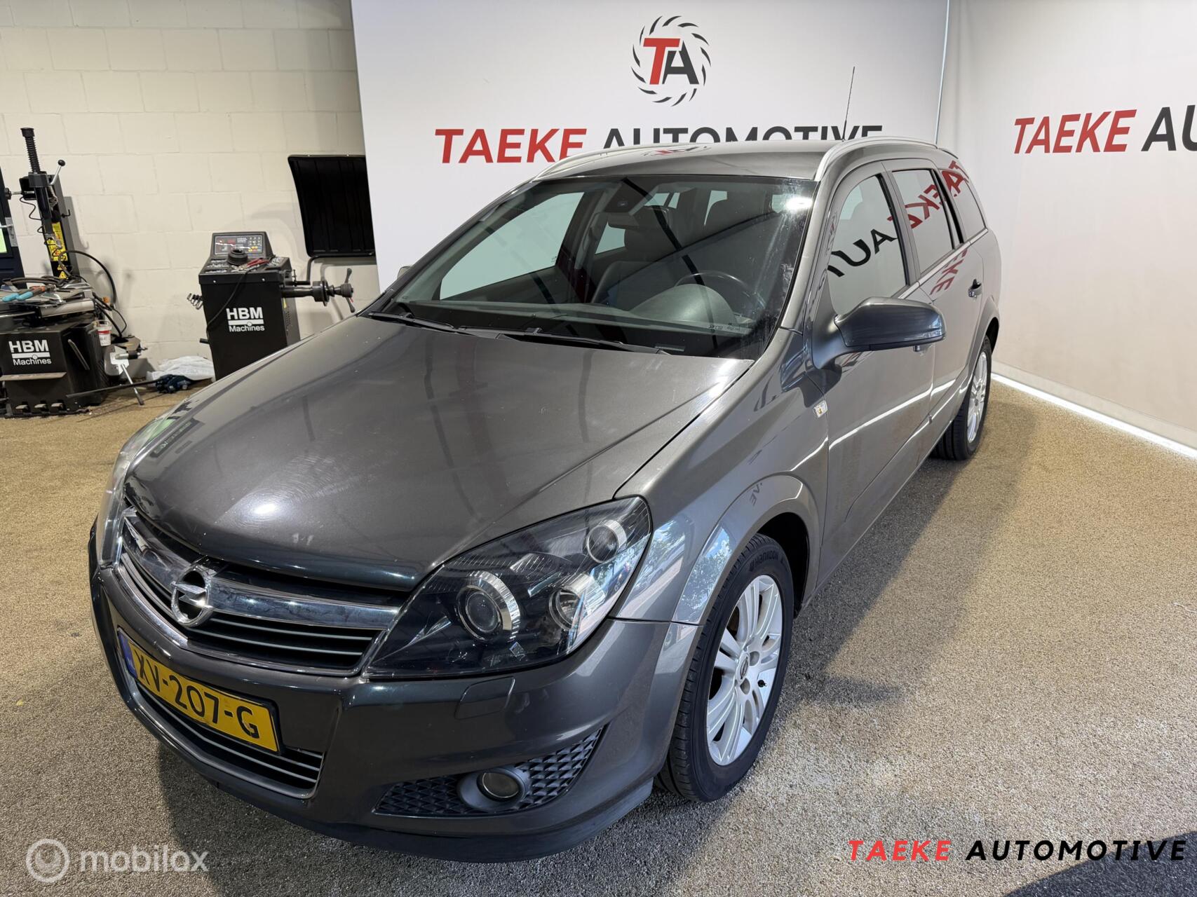 Opel Astra Station Wagon 1.6 Business CLIMA/CRUISE/APK/TREKHAAK 2009 - voorkant