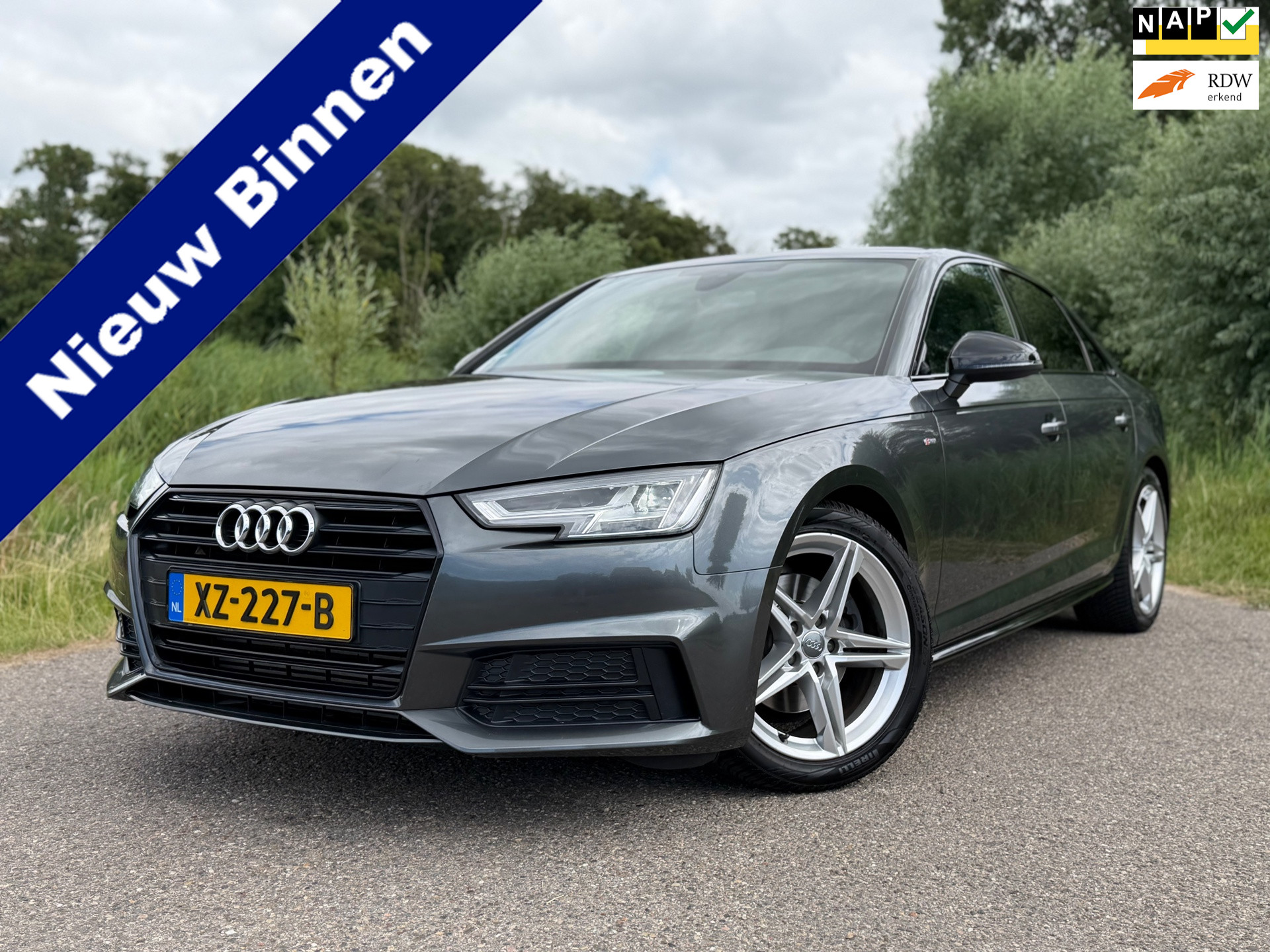 Audi A4 Limousine 2.0 TFSI MHEV Sport S line black edition / NL Auto / Automaat / Navigatie / Climate Control / Stoelverwarming / 2019 - voorkant