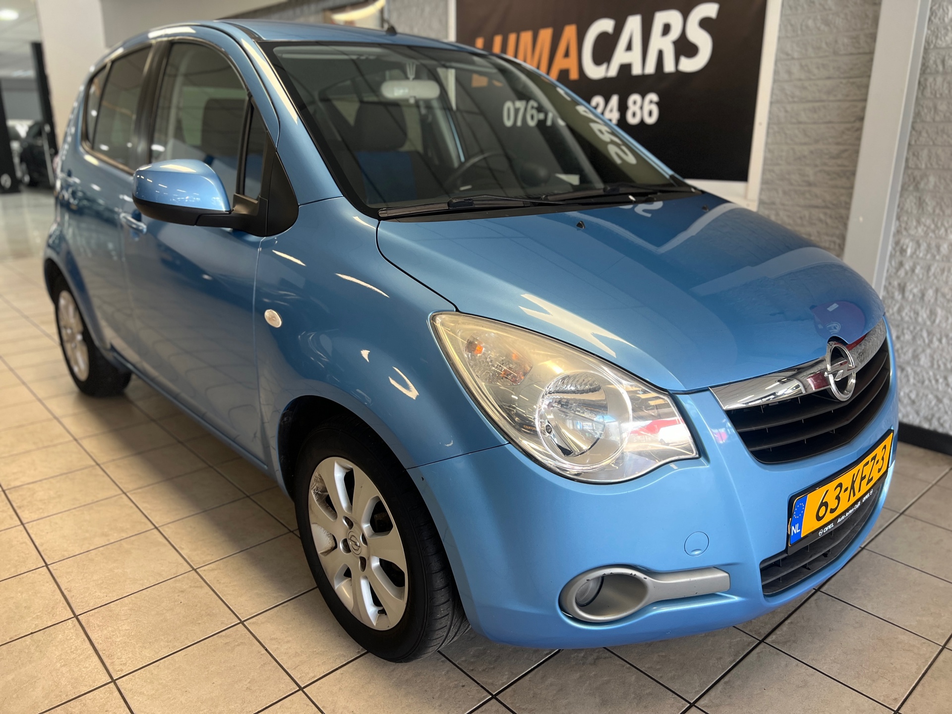 Opel Agila 1.0 Enjoy | Nieuwe APK | 5-deurs | Vol onderhoud 2009 - voorkant