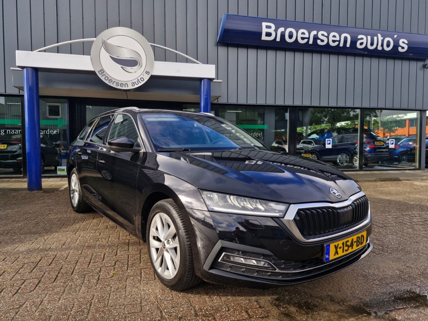 Skoda Octavia 1.0 e-TSI Business Edition Plus | Navigatie | Trekhaak | Cruise Control | 2023 - voorkant