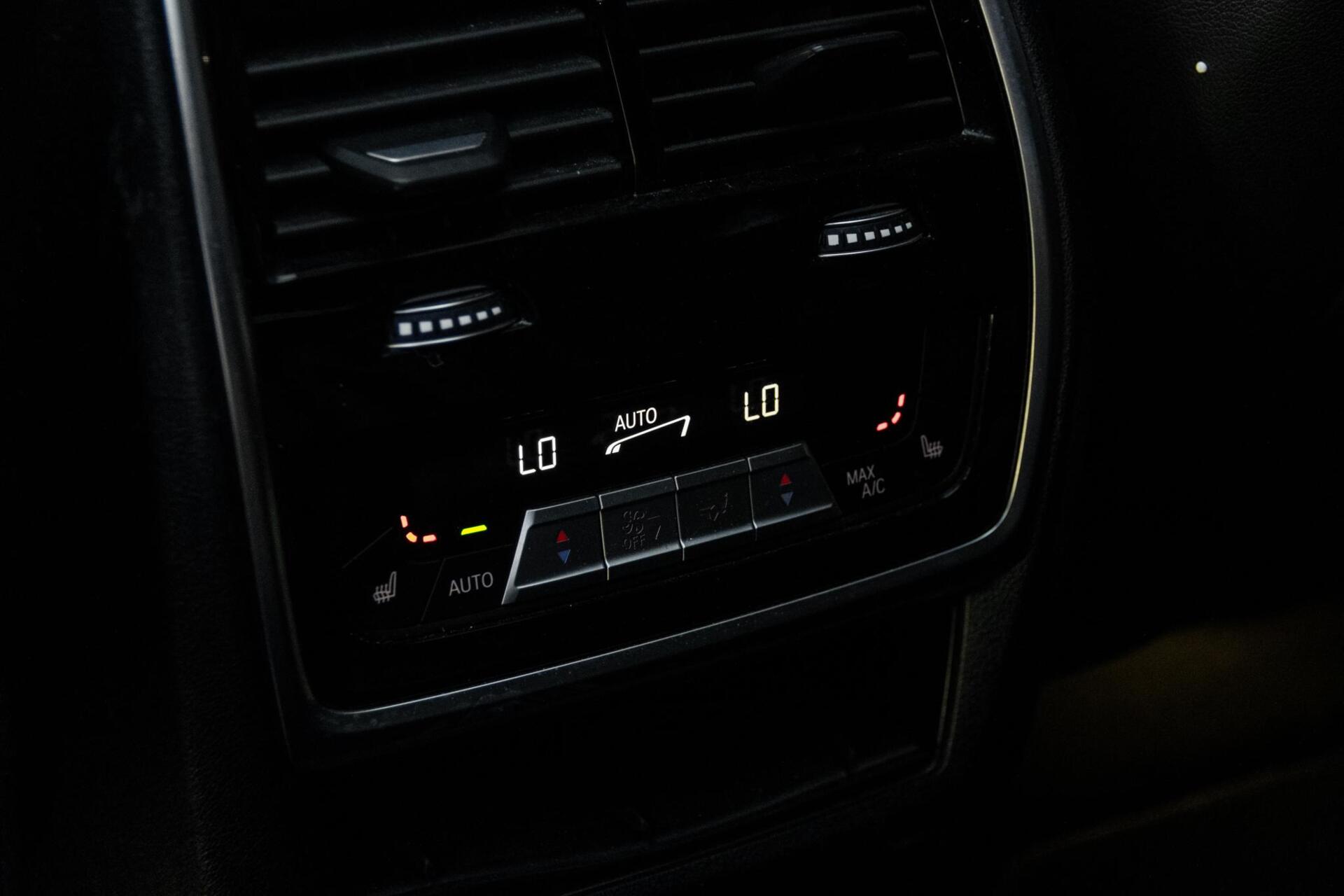 Foto van BMW X6 M50d
