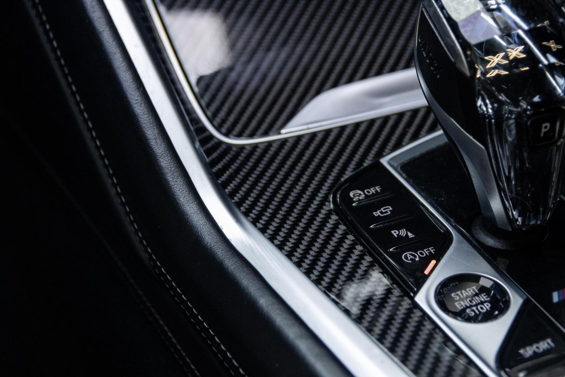 Foto van BMW X6 M50d