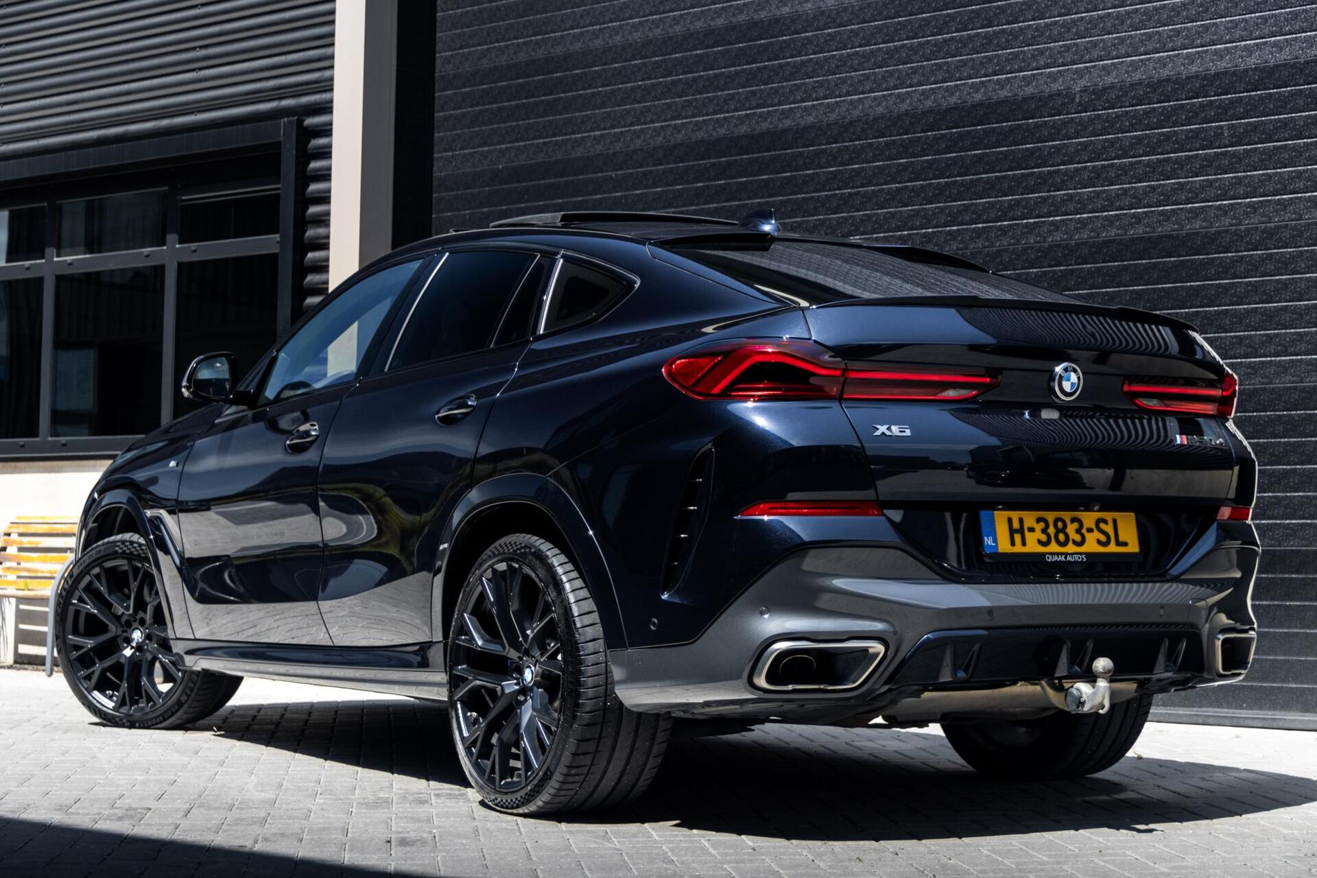 Foto van BMW X6 M50d