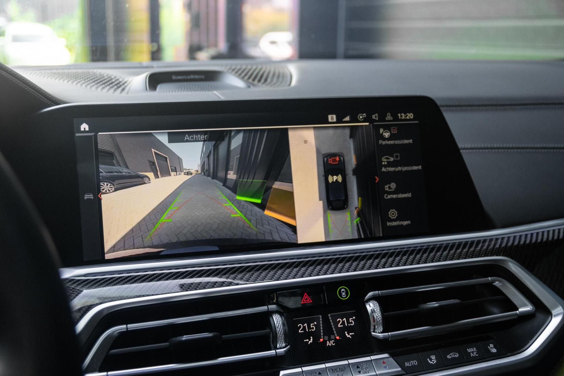 Foto van BMW X6 M50d
