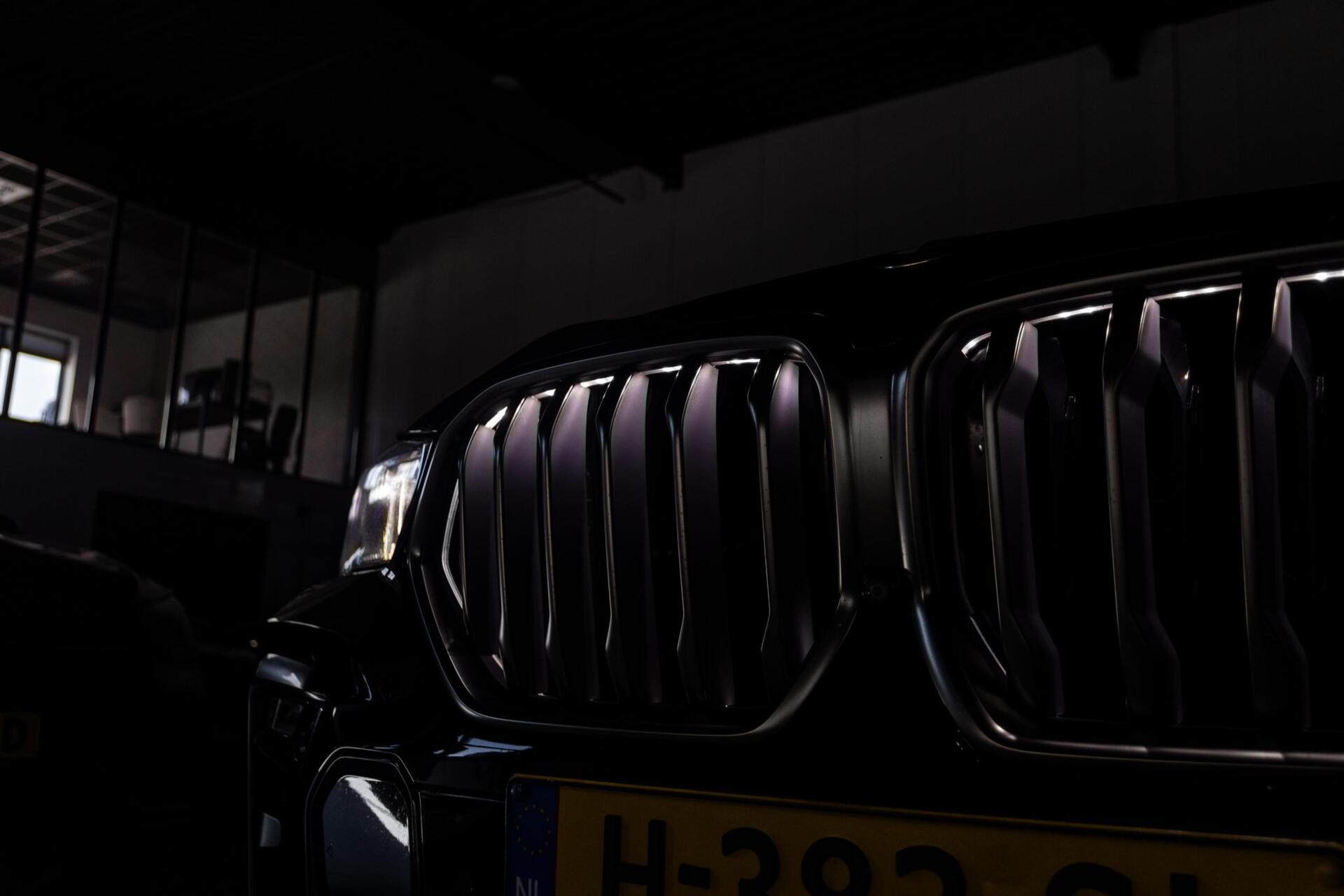 Foto van BMW X6 M50d