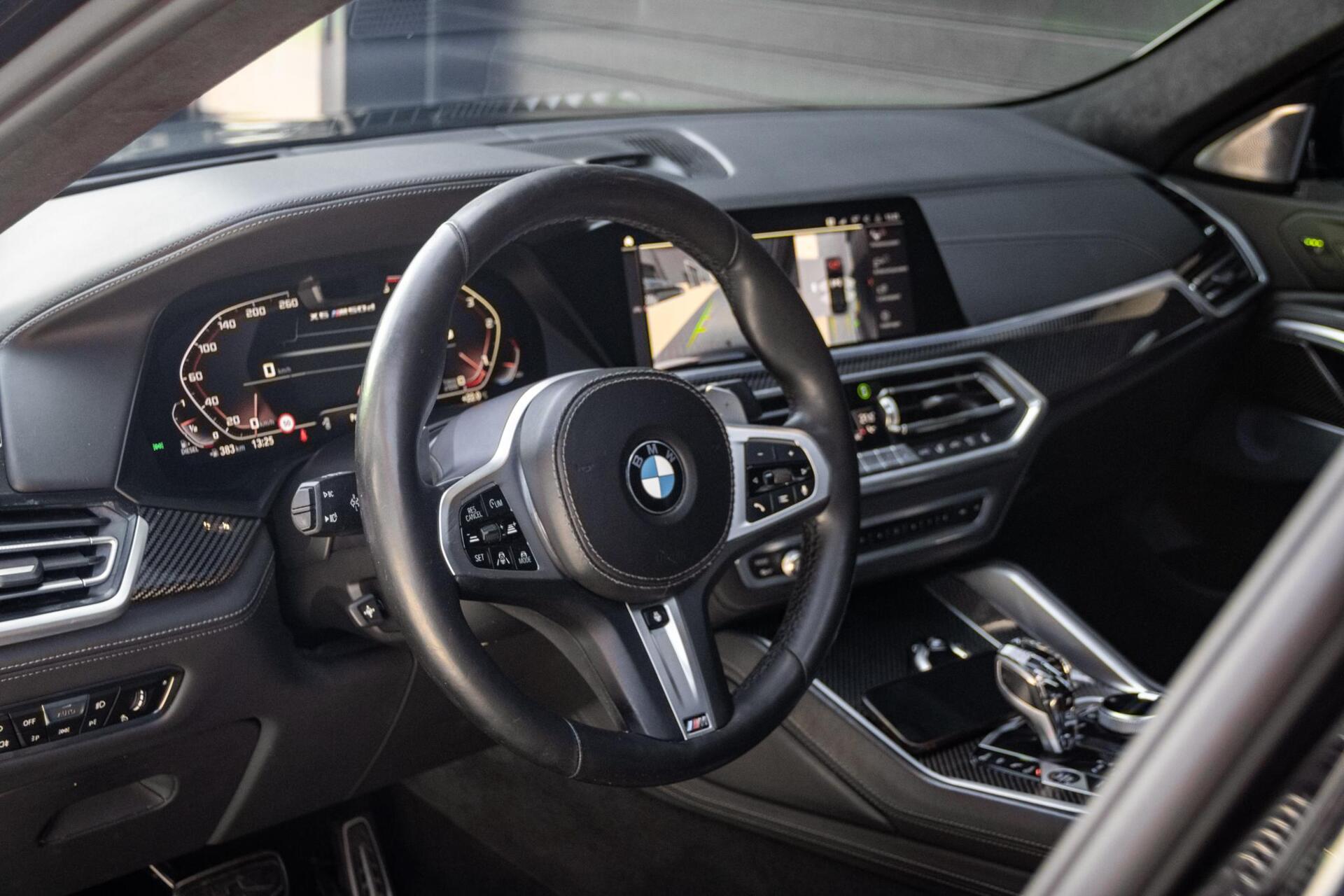 Foto van BMW X6 M50d