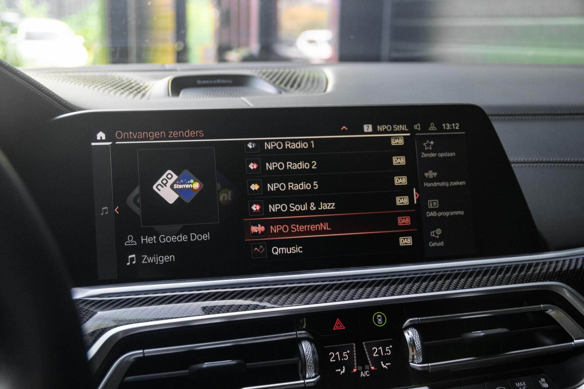 Foto van BMW X6 M50d