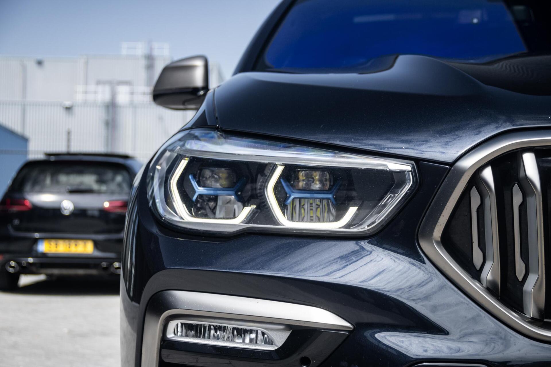 Foto van BMW X6 M50d
