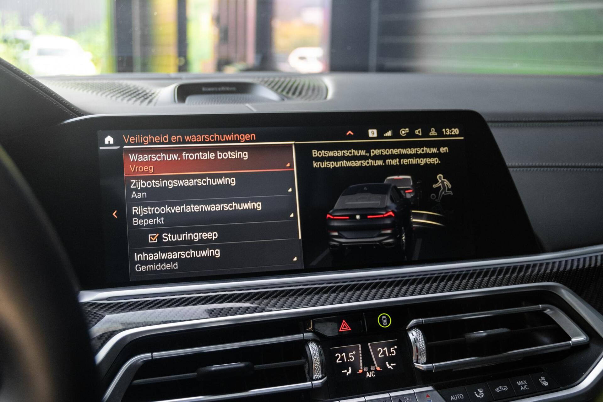 Foto van BMW X6 M50d