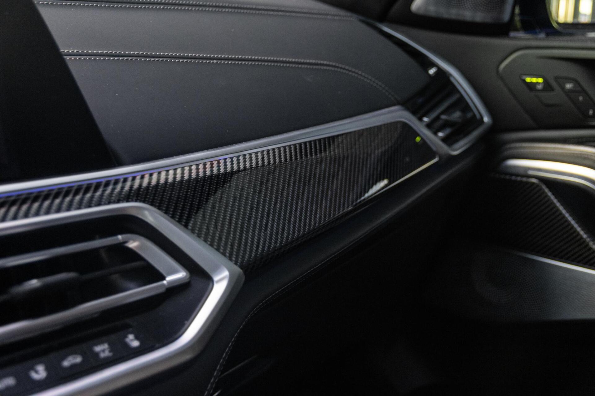 Foto van BMW X6 M50d