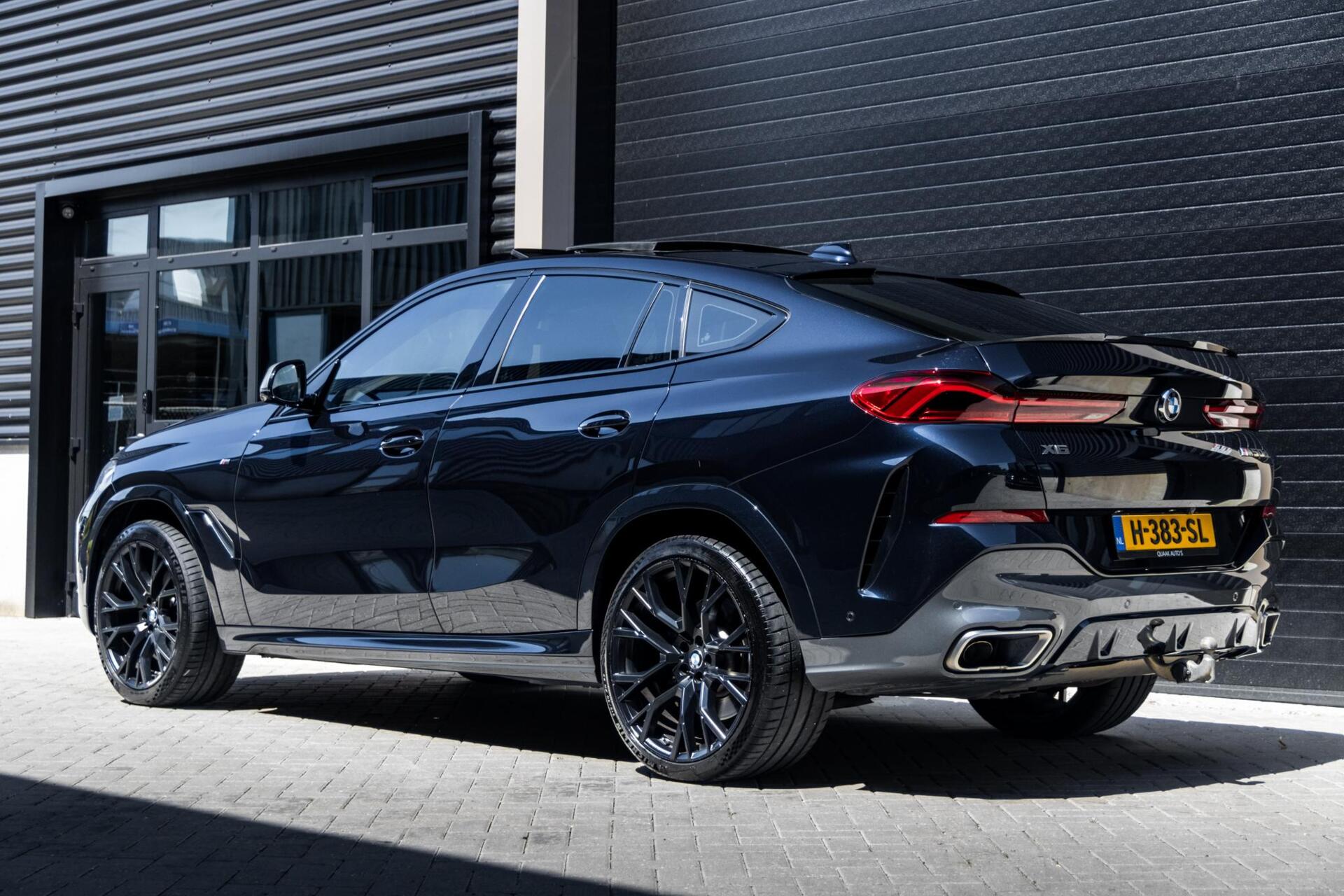 Foto van BMW X6 M50d