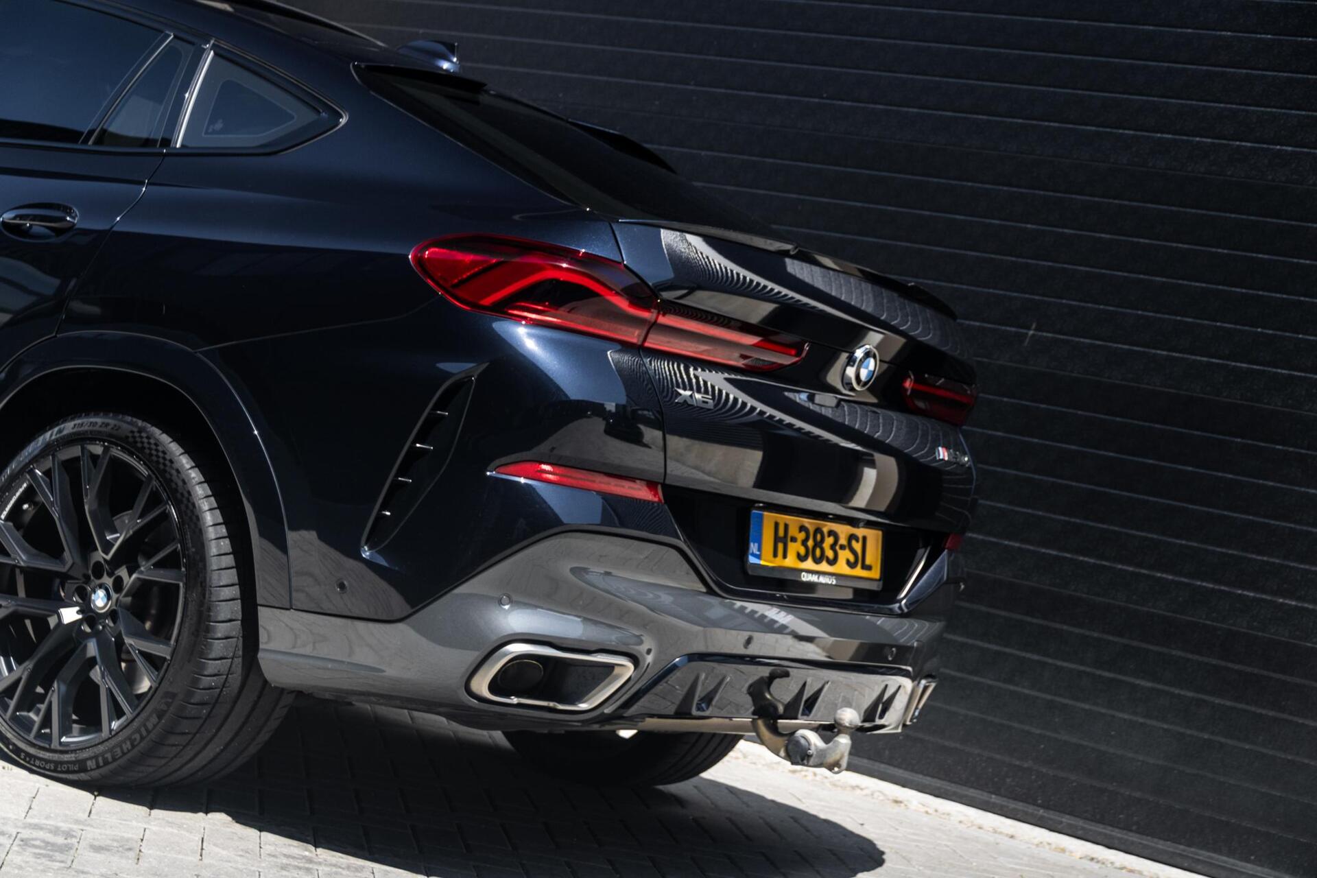 Foto van BMW X6 M50d