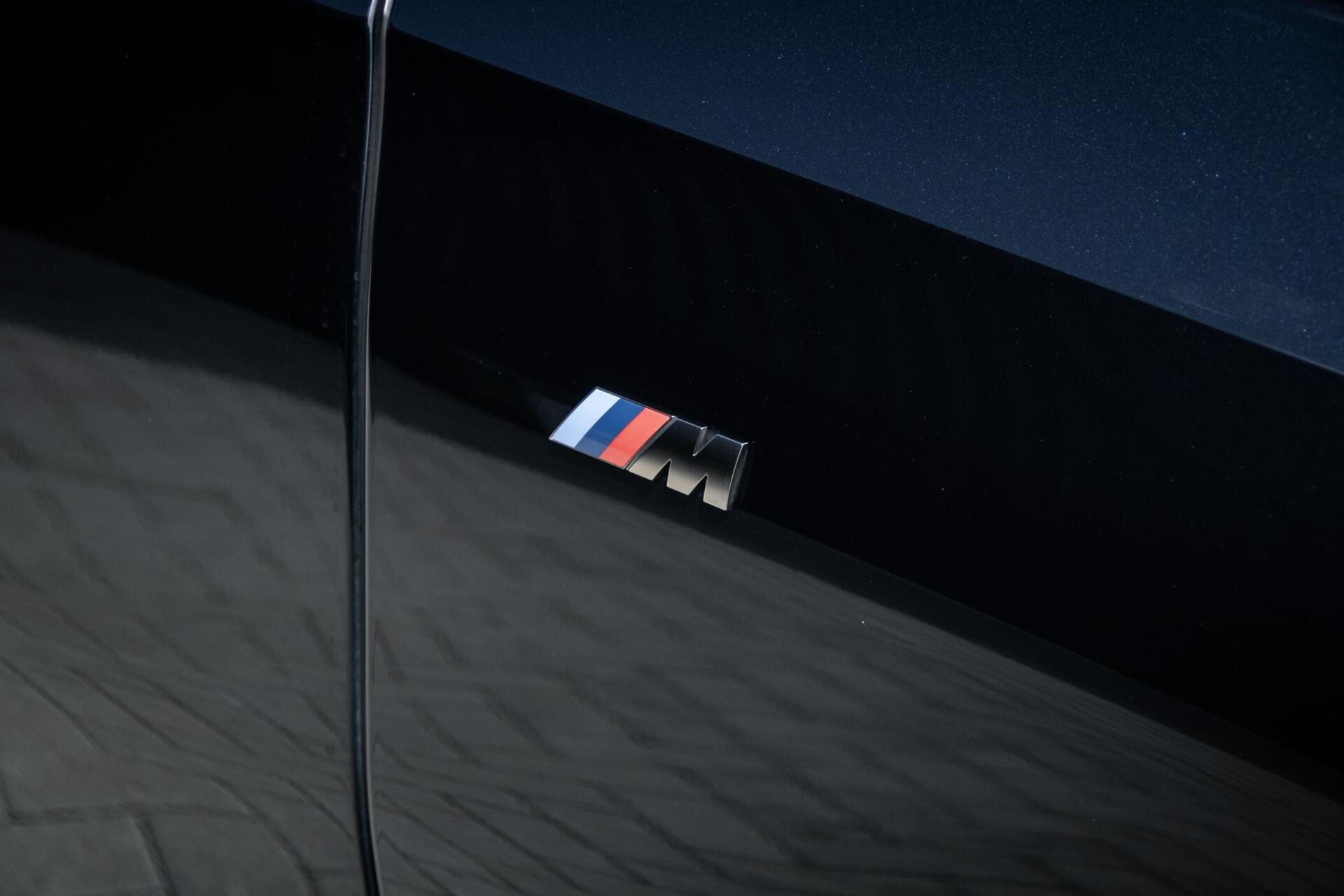 Foto van BMW X6 M50d