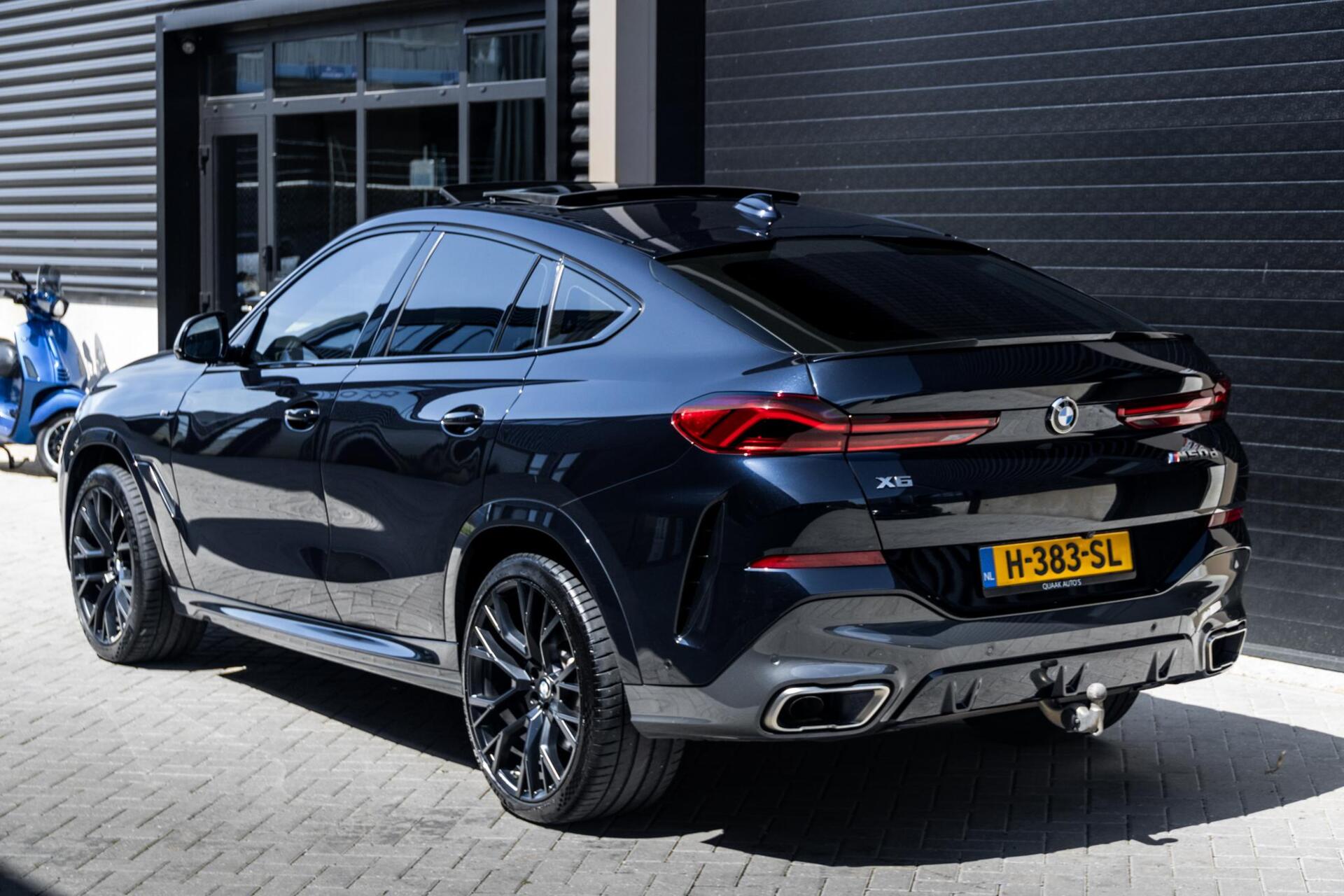 Foto van BMW X6 M50d