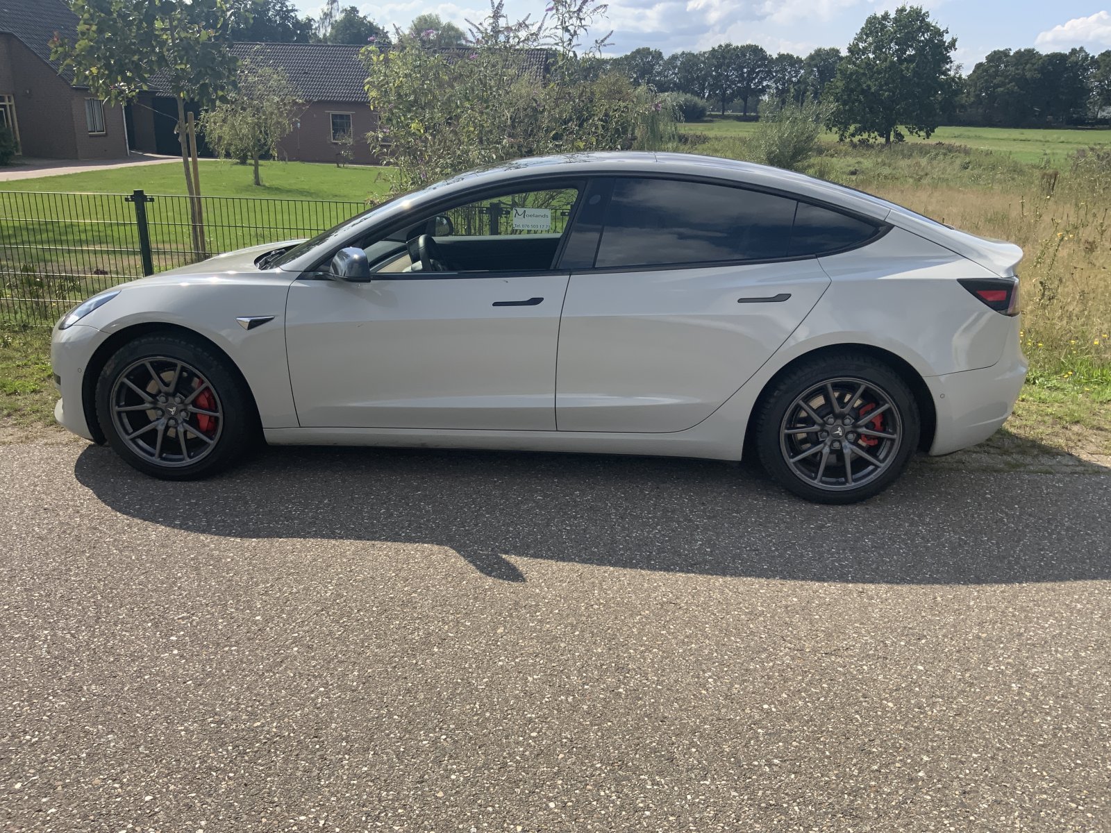 Inspectiefoto van Tesla Model 3