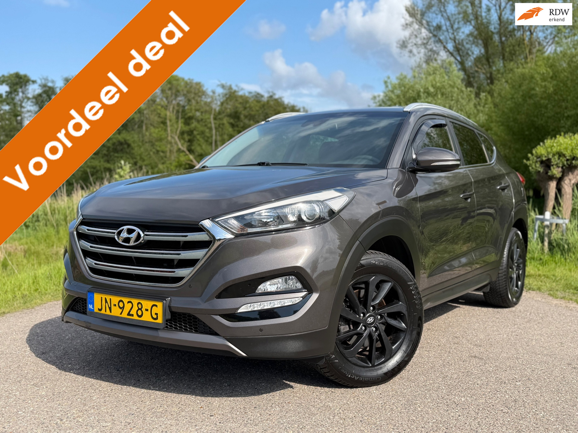 Hyundai Tucson 1.6 GDi Comfort / Navigatie / Camera / Cruise Control / Climate Control / Stoelverwarming / 17"LM Velgen 2016 - voorkant