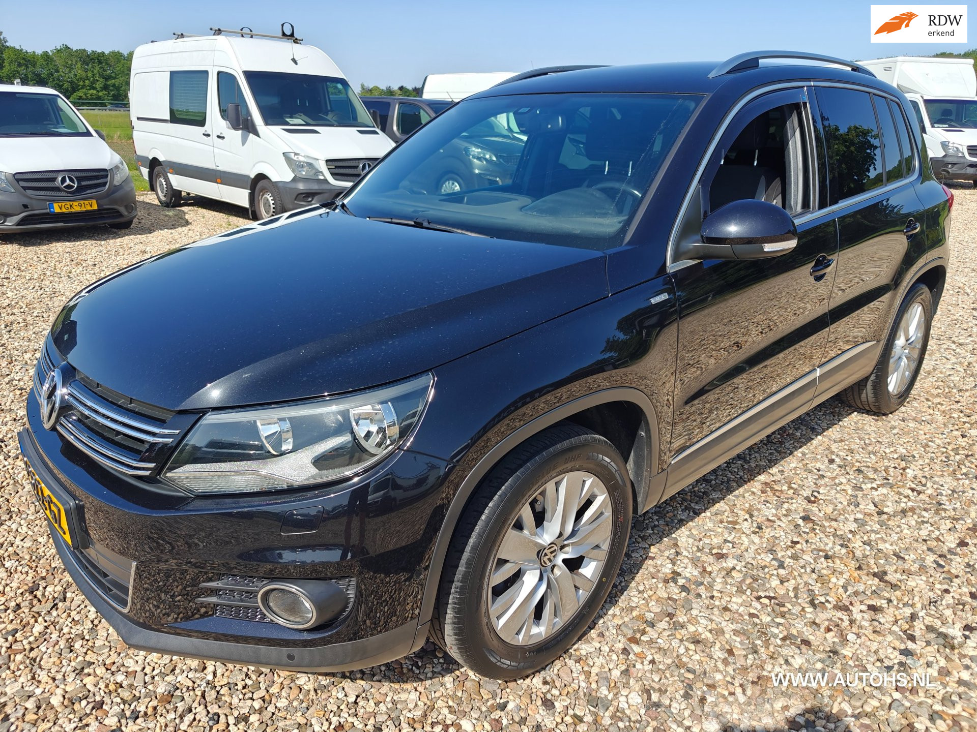 Volkswagen Tiguan 1.4 TSI Sport&Style , Apk juli 2027 , nette auto. 2014 - voorkant