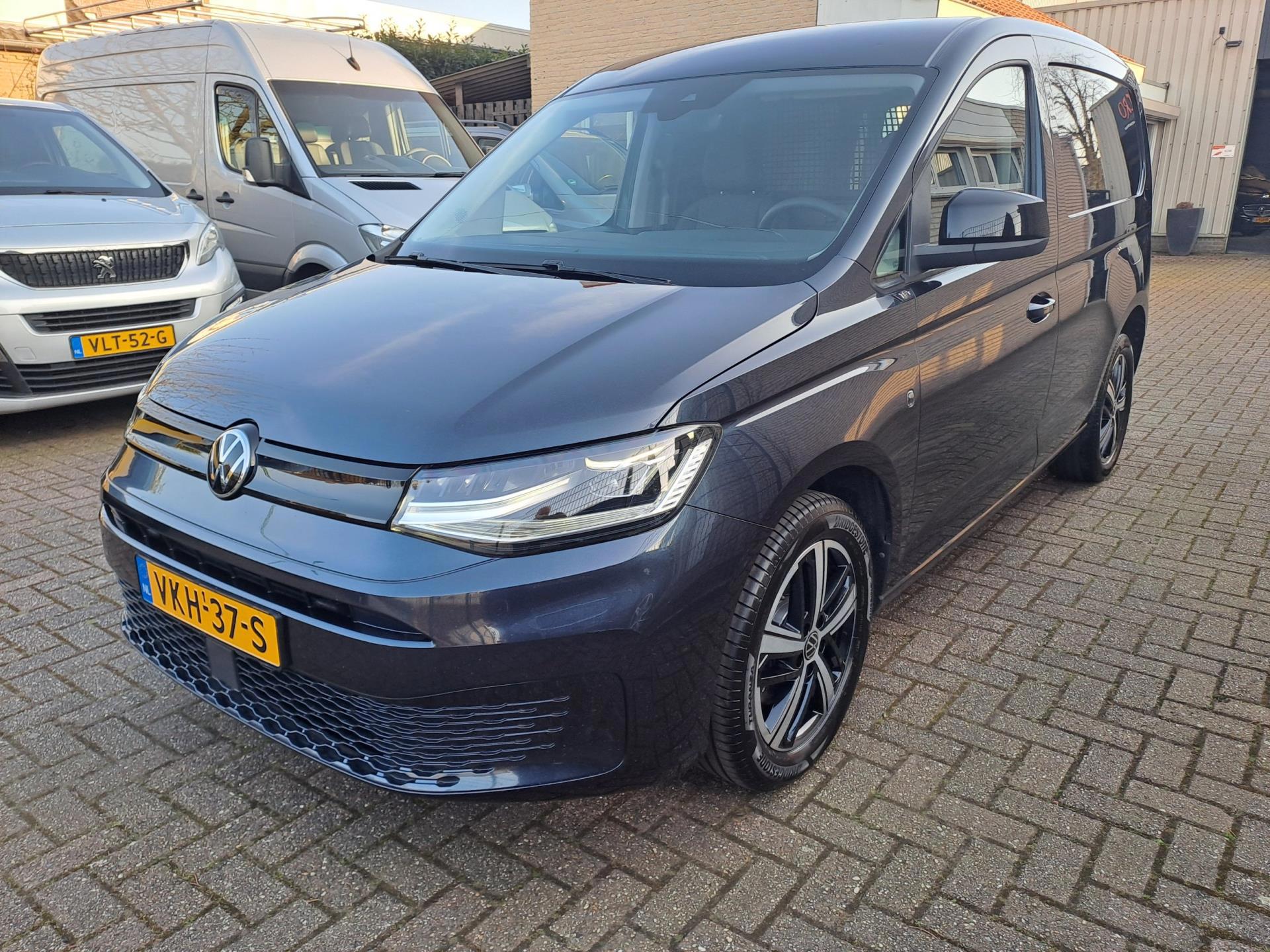 Foto van Volkswagen Caddy Modified Partition Wall