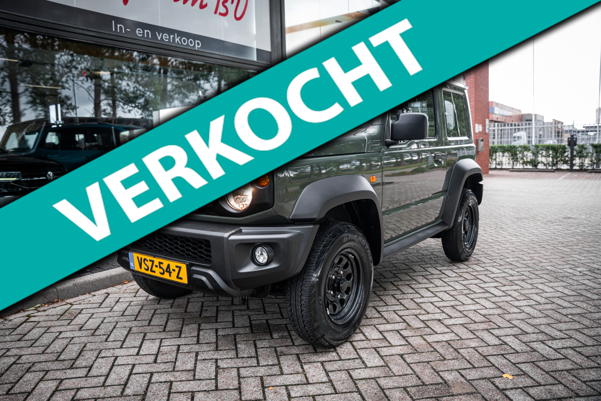 Suzuki Jimny 1.4 4wd | Airco | Cruise | Lane departure warning | Grijs kent | Trekhaak 2023 - voorkant