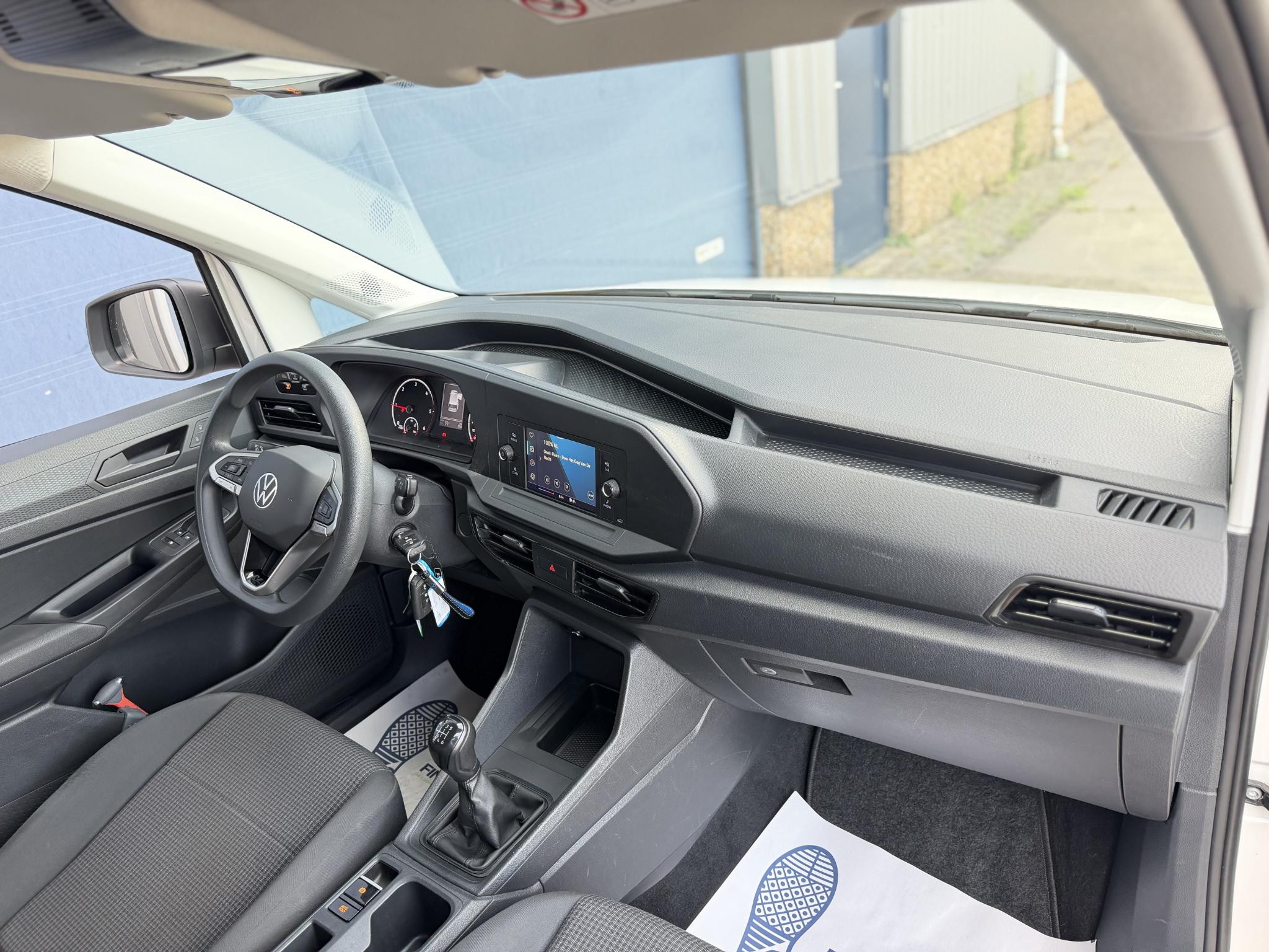 Foto van Volkswagen Caddy Modified Partition Wall