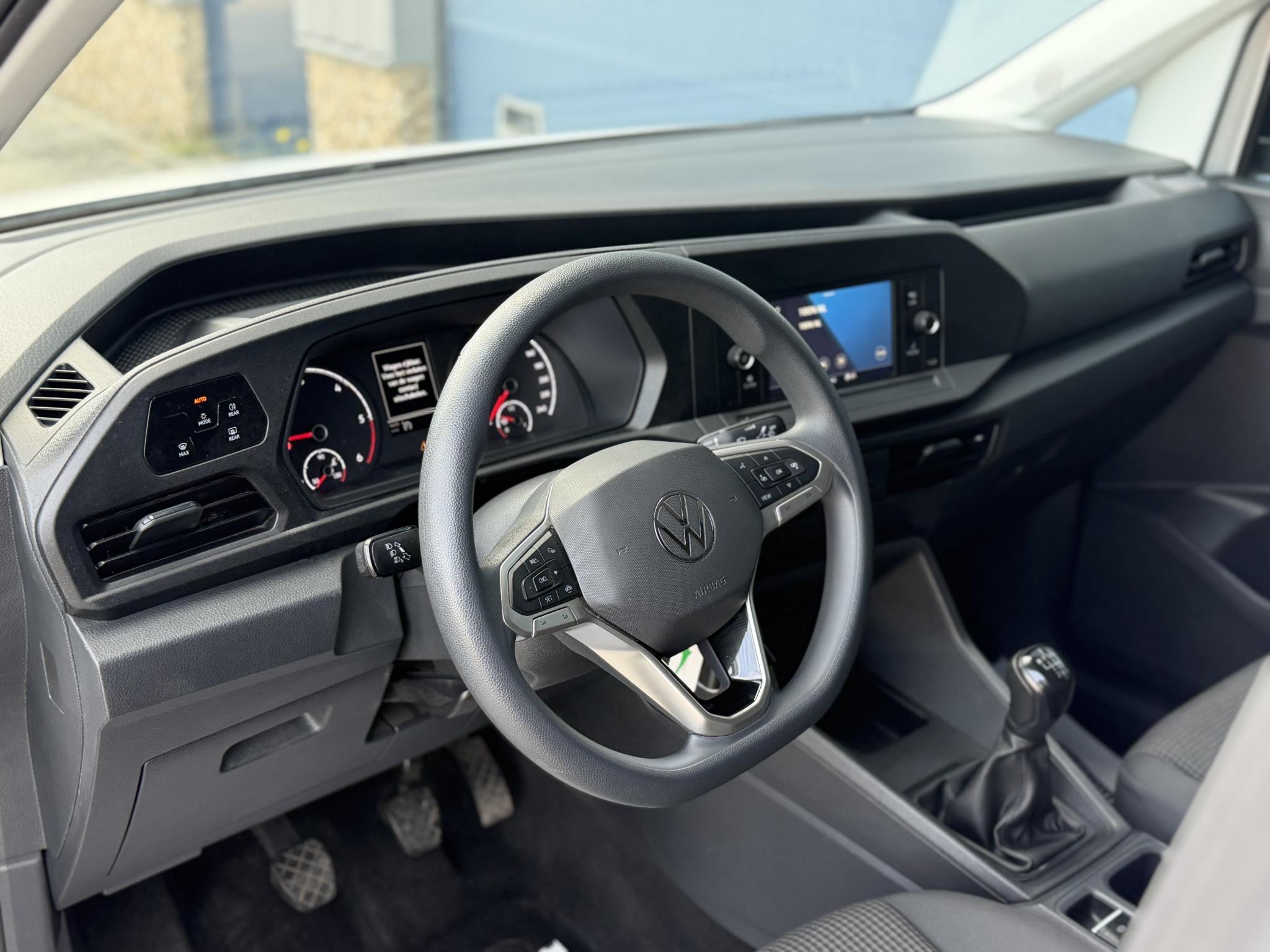 Foto van Volkswagen Caddy Modified Partition Wall