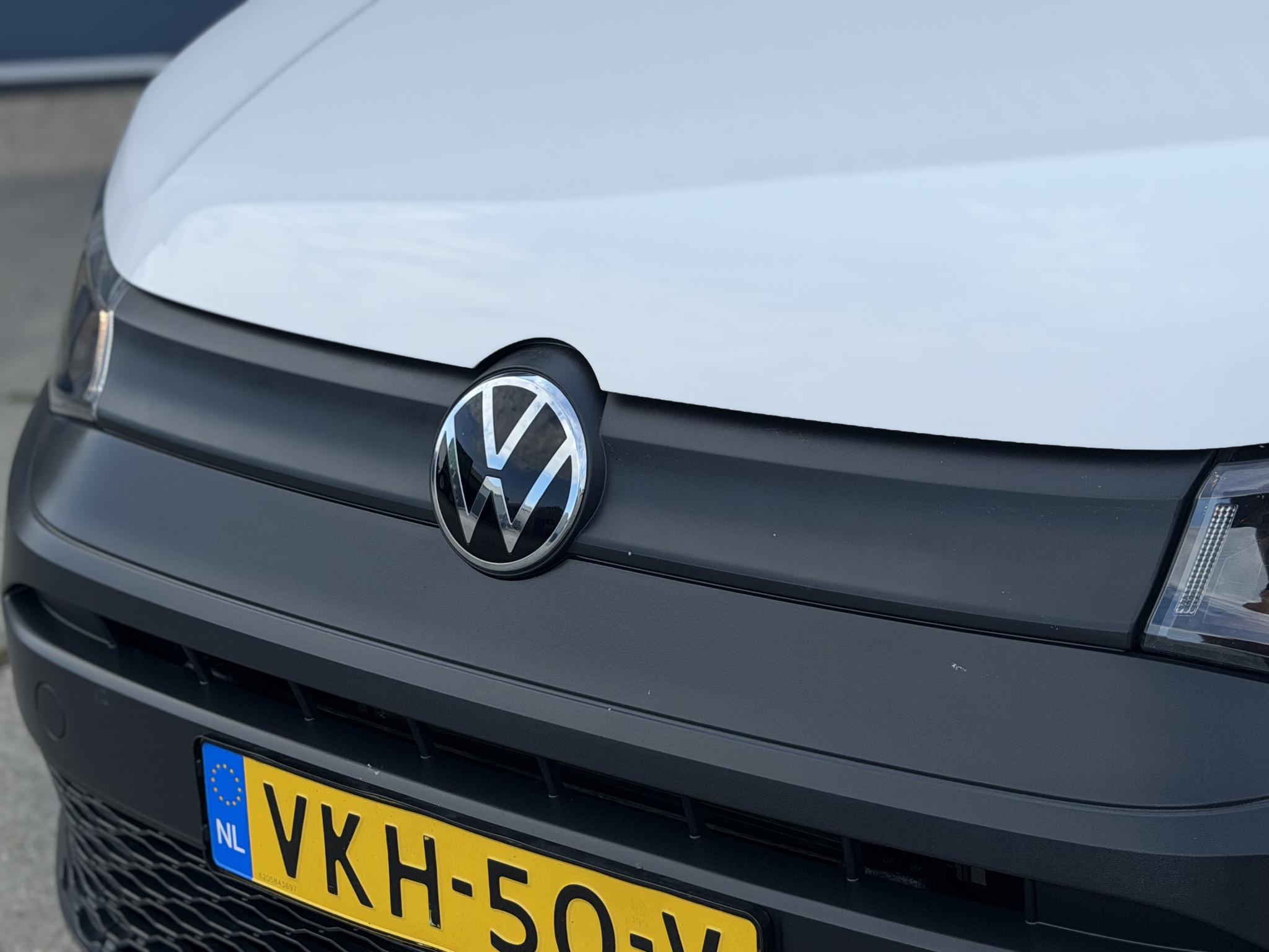 Foto van Volkswagen Caddy Modified Partition Wall