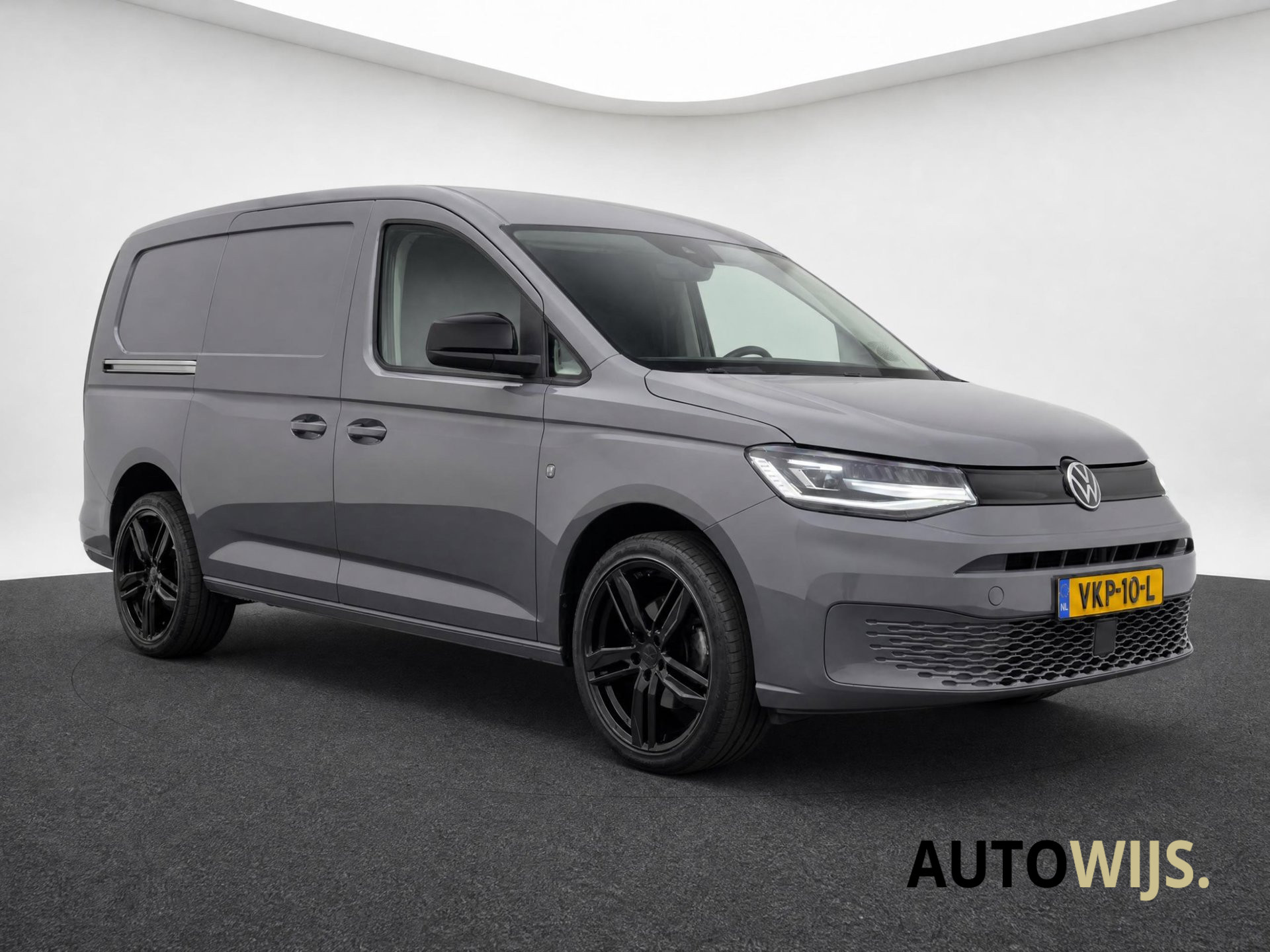 Foto van Volkswagen Caddy Modified Partition Wall
