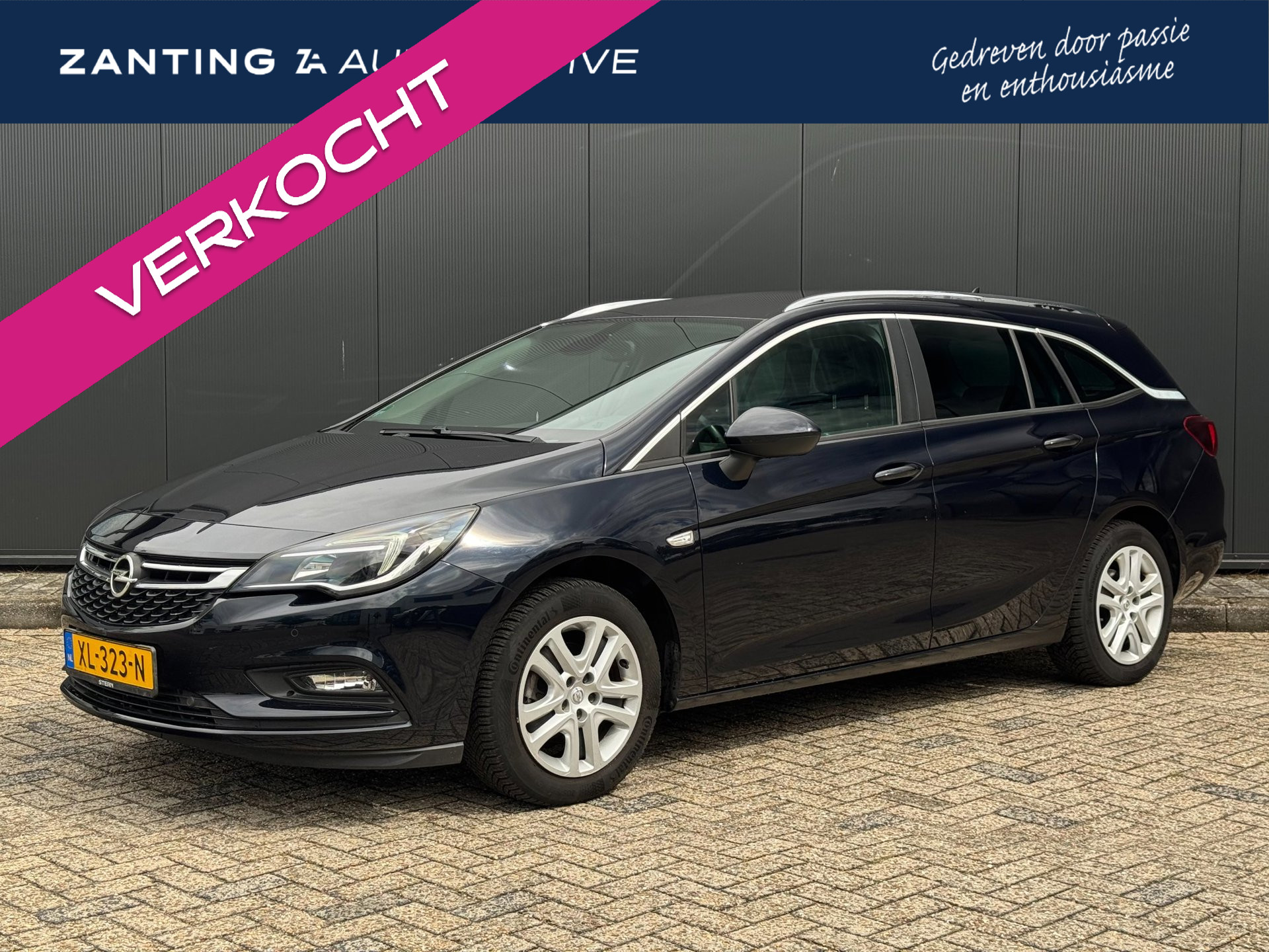 Opel Astra Sports Tourer 1.4 Turbo 150pk | Trekhaak | AGR-Stoelen | Orig. NL | LED koplampen |100% Onderhoudshistorie | All-Season 2019 - voorkant