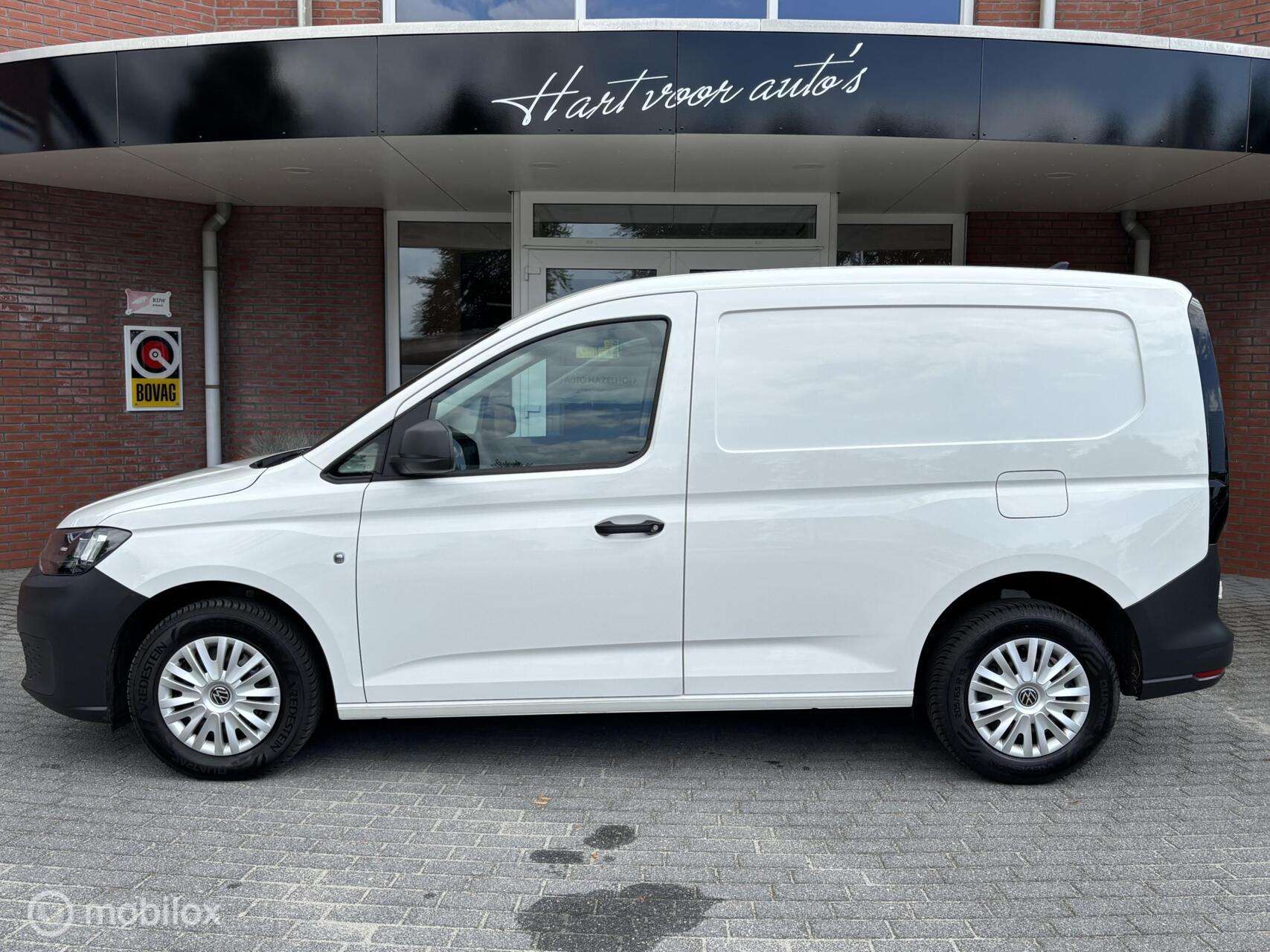 Foto van Volkswagen Caddy Modified Partition Wall