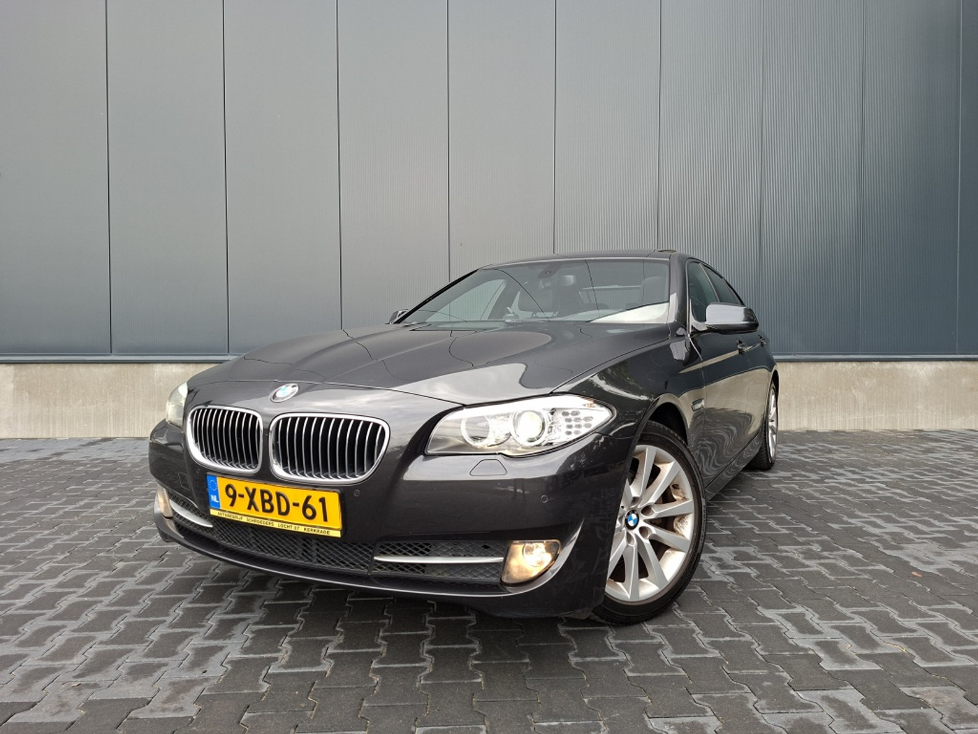BMW 5er Reihe 523i High Executive | 6 cilinder | Schuif/kanteldak | Trekhaak | Lederen bekleding 2010 - voorkant