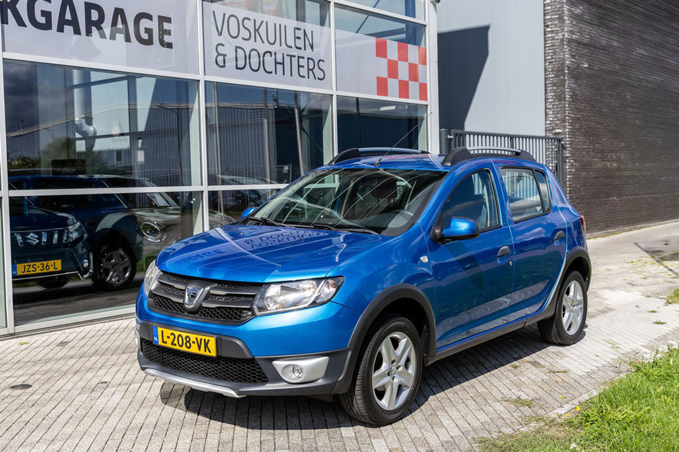 Dacia Sandero 0.9 TCe Stepway Lauréate 2015 - voorkant