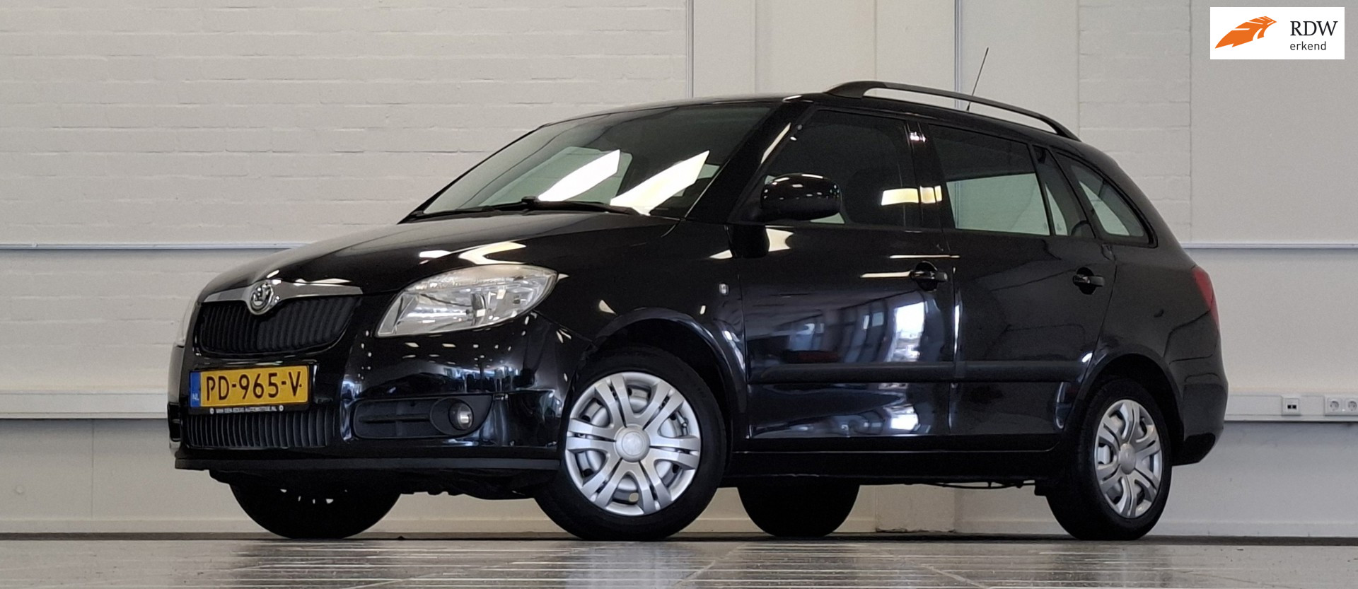Skoda Fabia 1.2i 12V Ambition Airco Garantie APK 23-03-2027 2009 - voorkant