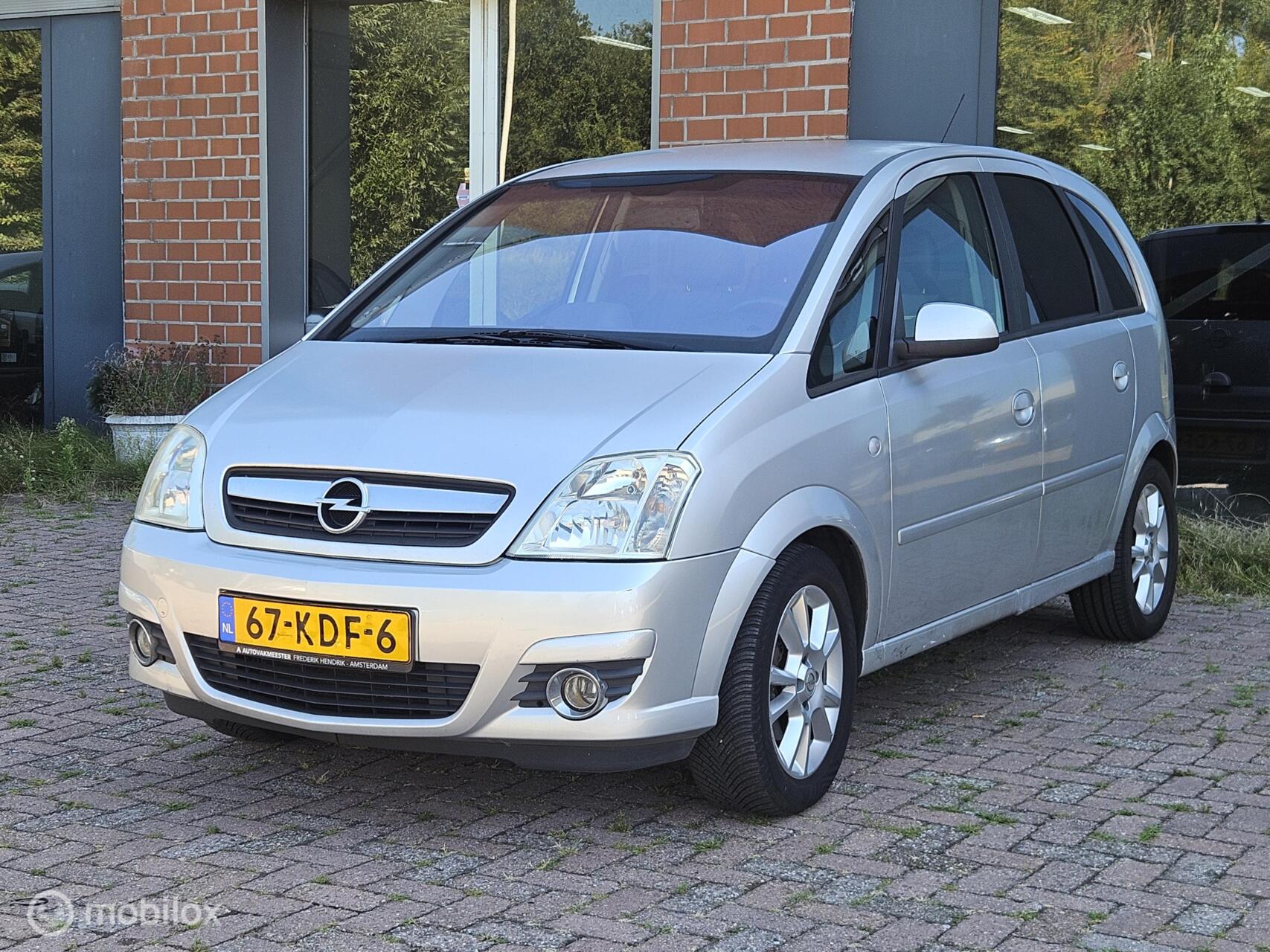 Opel Meriva-a 1.6-16V Cosmo 2009 - voorkant