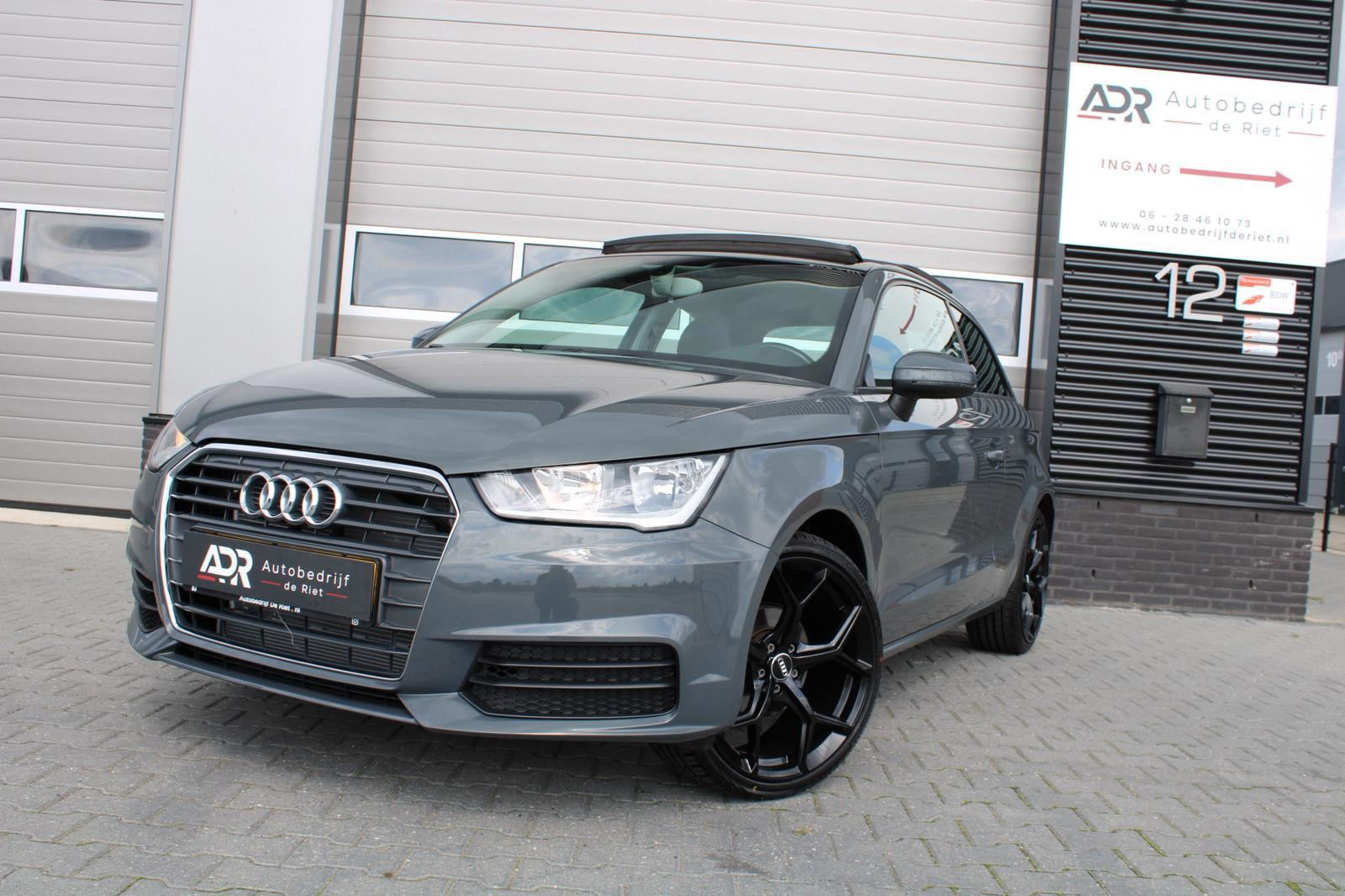 Audi A1 1.0 TFSI|18''LM|AIRCO|PDC|NAVI|NARDOGREY|PANO|UNIEK 2017 - voorkant