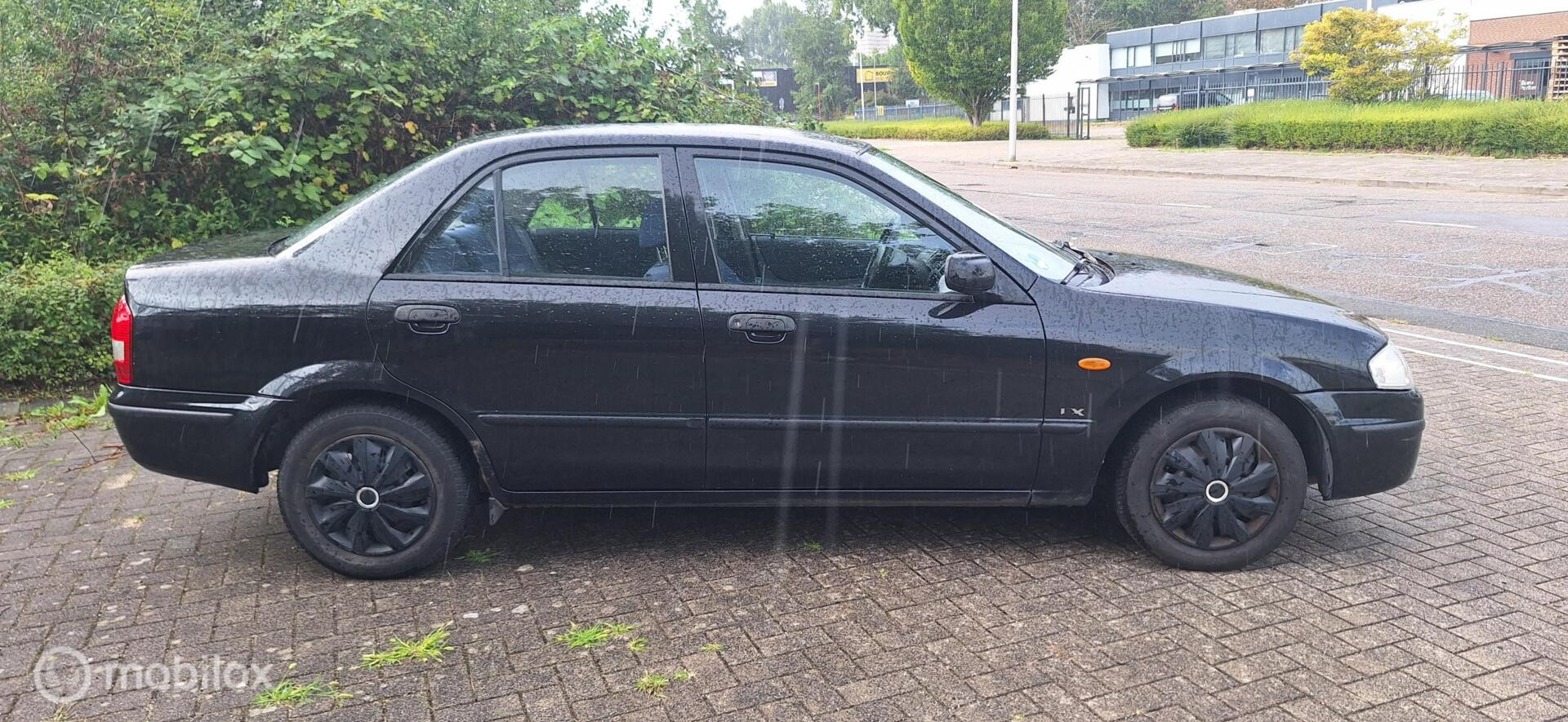 Foto van Mazda Mazda 323