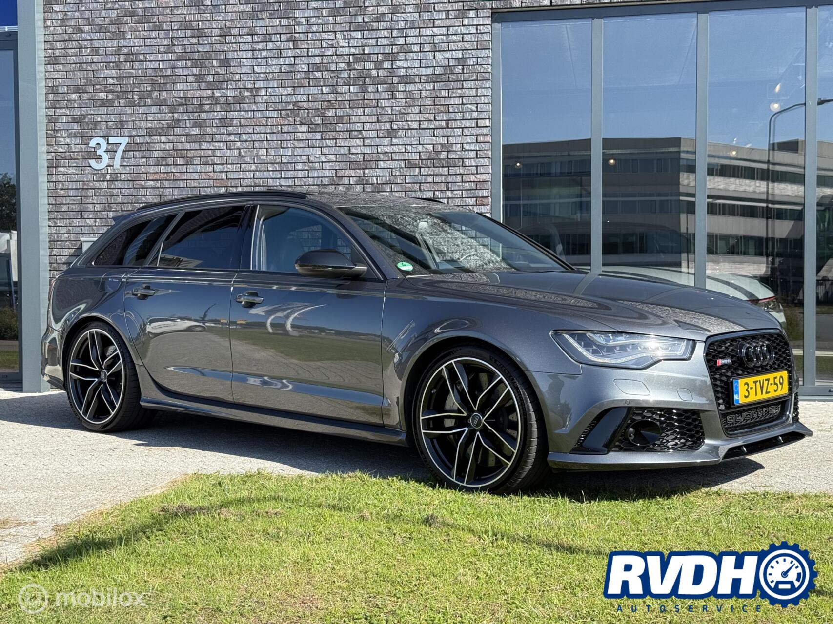 Audi RS 6 Avant 4.0 TFSI quattro |Keramisch|Pano|Carbon|HUD 2013 - voorkant