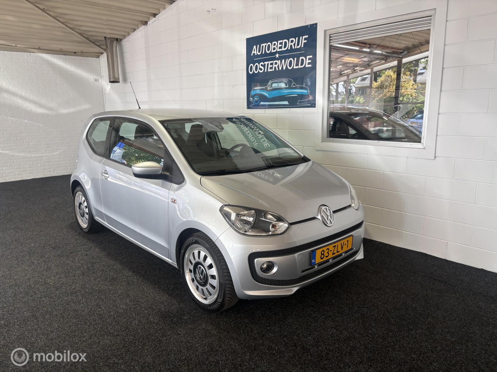 Volkswagen Up 1.0 High up! Airco - Navi - Stoelverwarming - APK - NAP - CV+AB - BlueMotion 2013 - voorkant