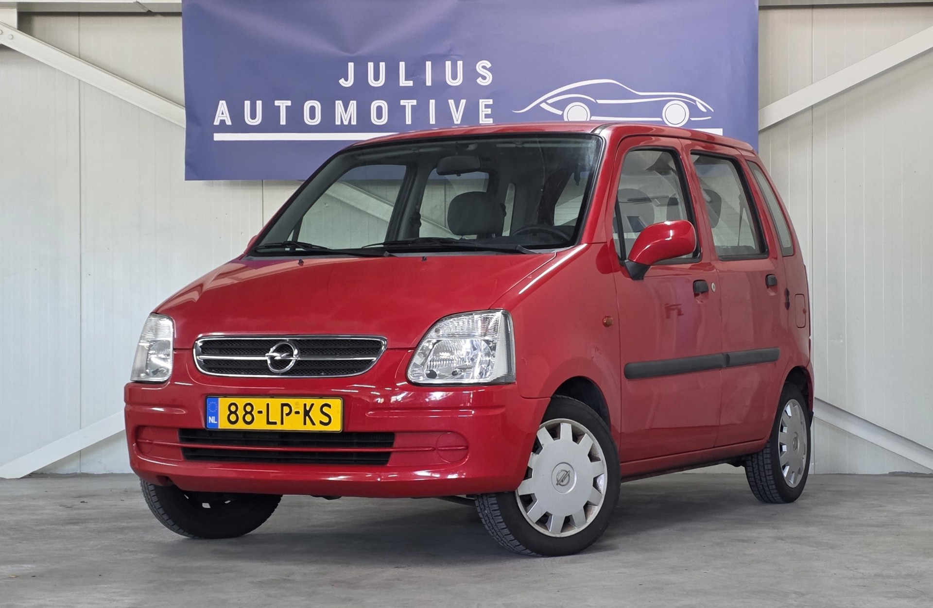 Opel Agila 1.0-12V Comfort APK 04-2027 Garantie Lak niet mooi! 2003 - voorkant