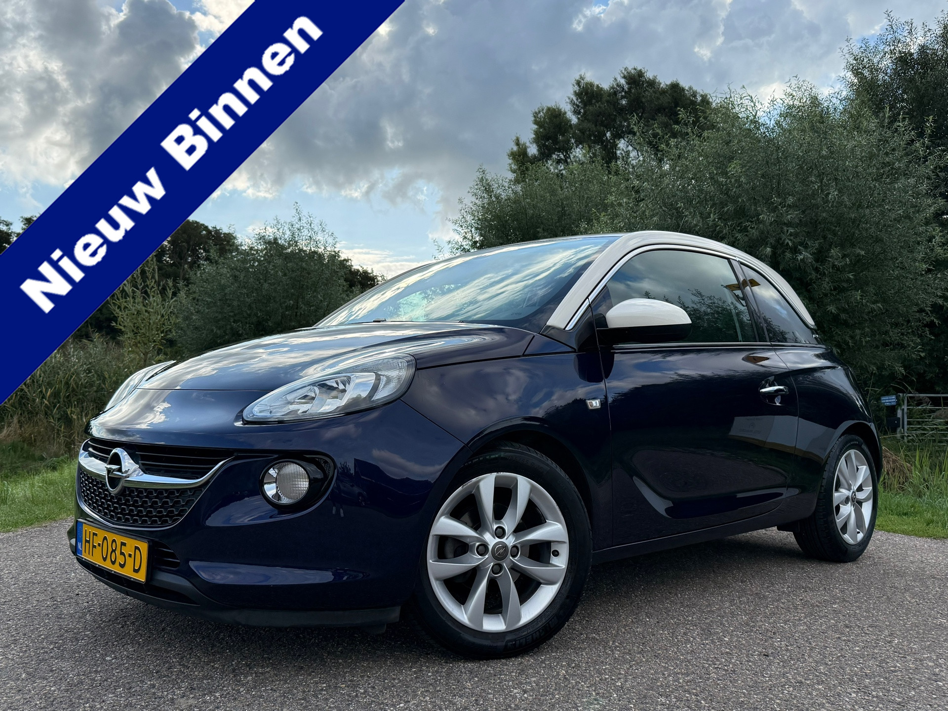 Opel Adam 1.0 Turbo Jam | 1e Eigenaar | slechts 75.511 km | White Pack | Airco | 16" Velgen | PDC | Cruise | Dealer Onderhouden! | 2015 - voorkant