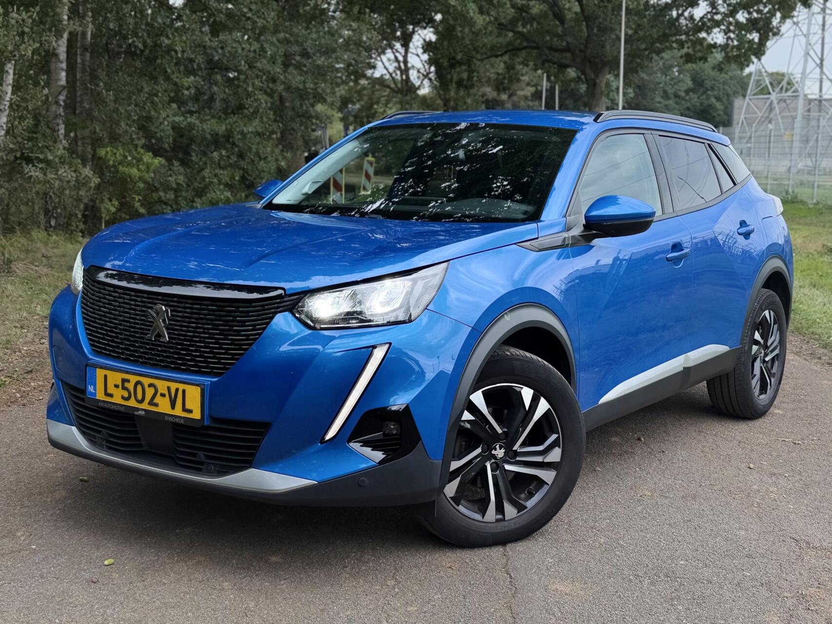 Peugeot 2008 1.2 AUT Keyless Camera DAB+ NAP ✅ 2021 - voorkant