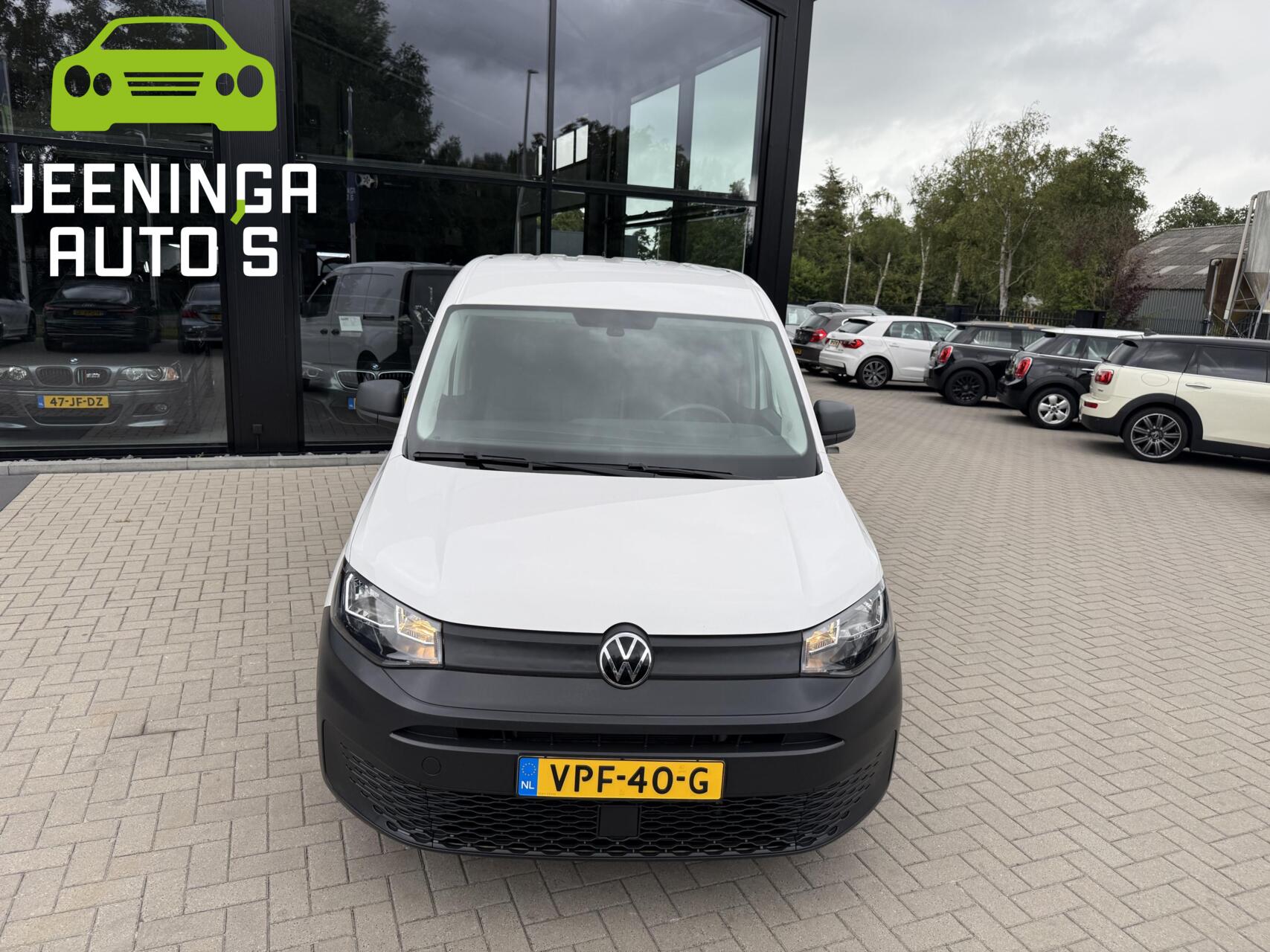 Foto van Volkswagen Caddy Modified Partition Wall