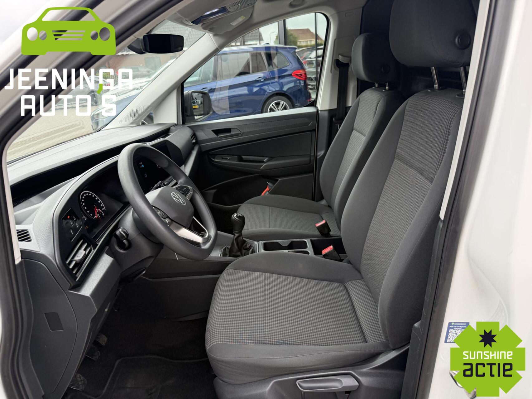 Foto van Volkswagen Caddy Modified Partition Wall