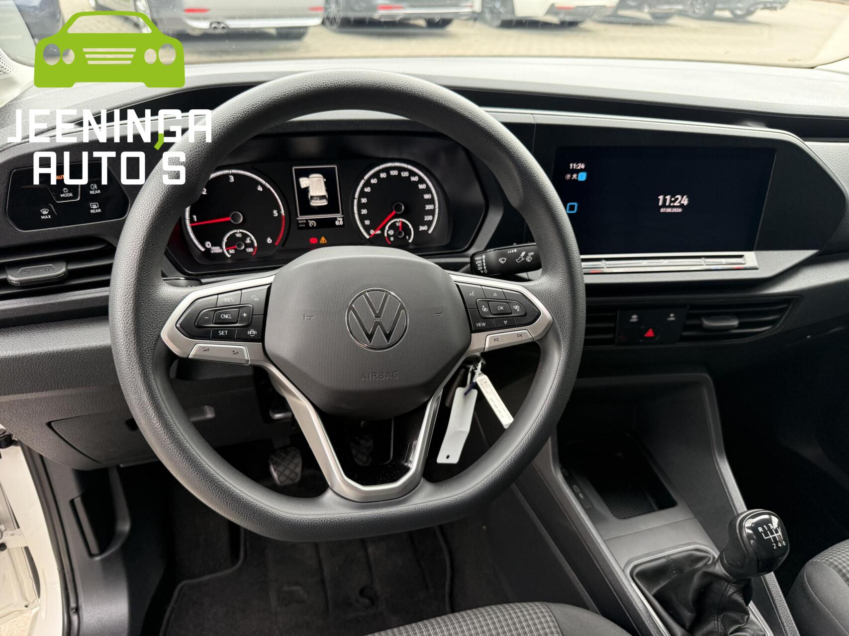 Foto van Volkswagen Caddy Modified Partition Wall