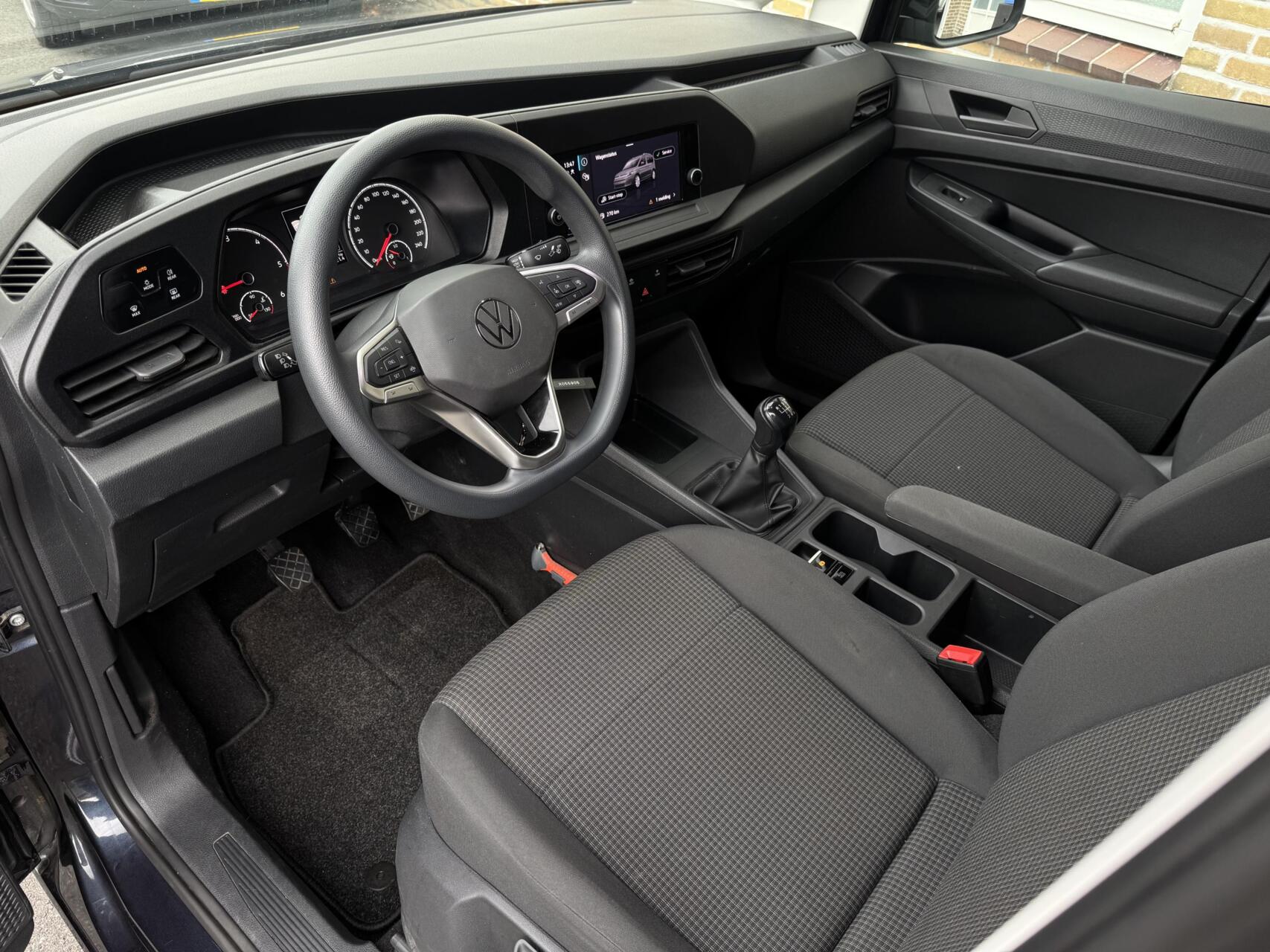 Foto van Volkswagen Caddy Modified Partition Wall