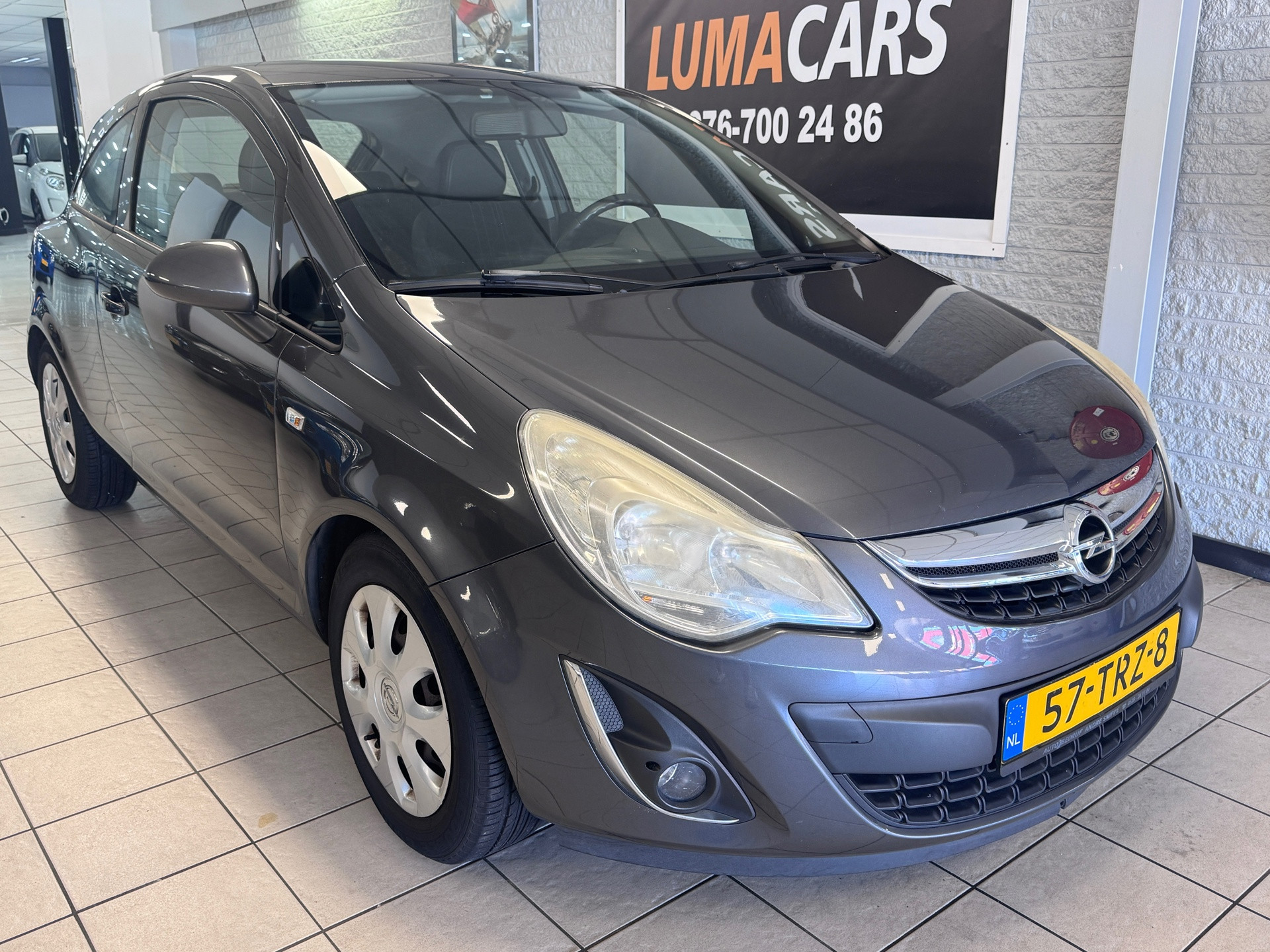 Opel Corsa 1.3 CDTi EcoFlex S/S Anniversary Edition | Airco 2012 - voorkant