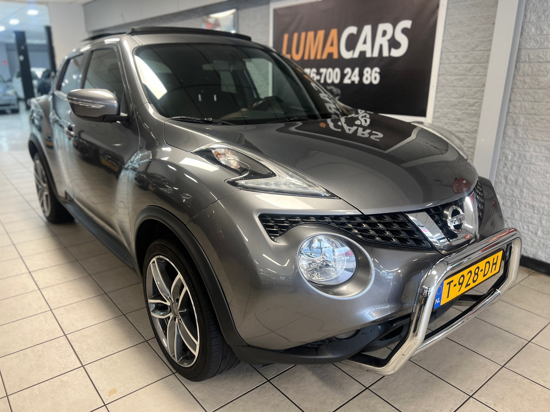 Nissan Nissan Juke 1.2 DIG-T S/S Tekna | Pano | Camera | Distri. VV 2015 - voorkant