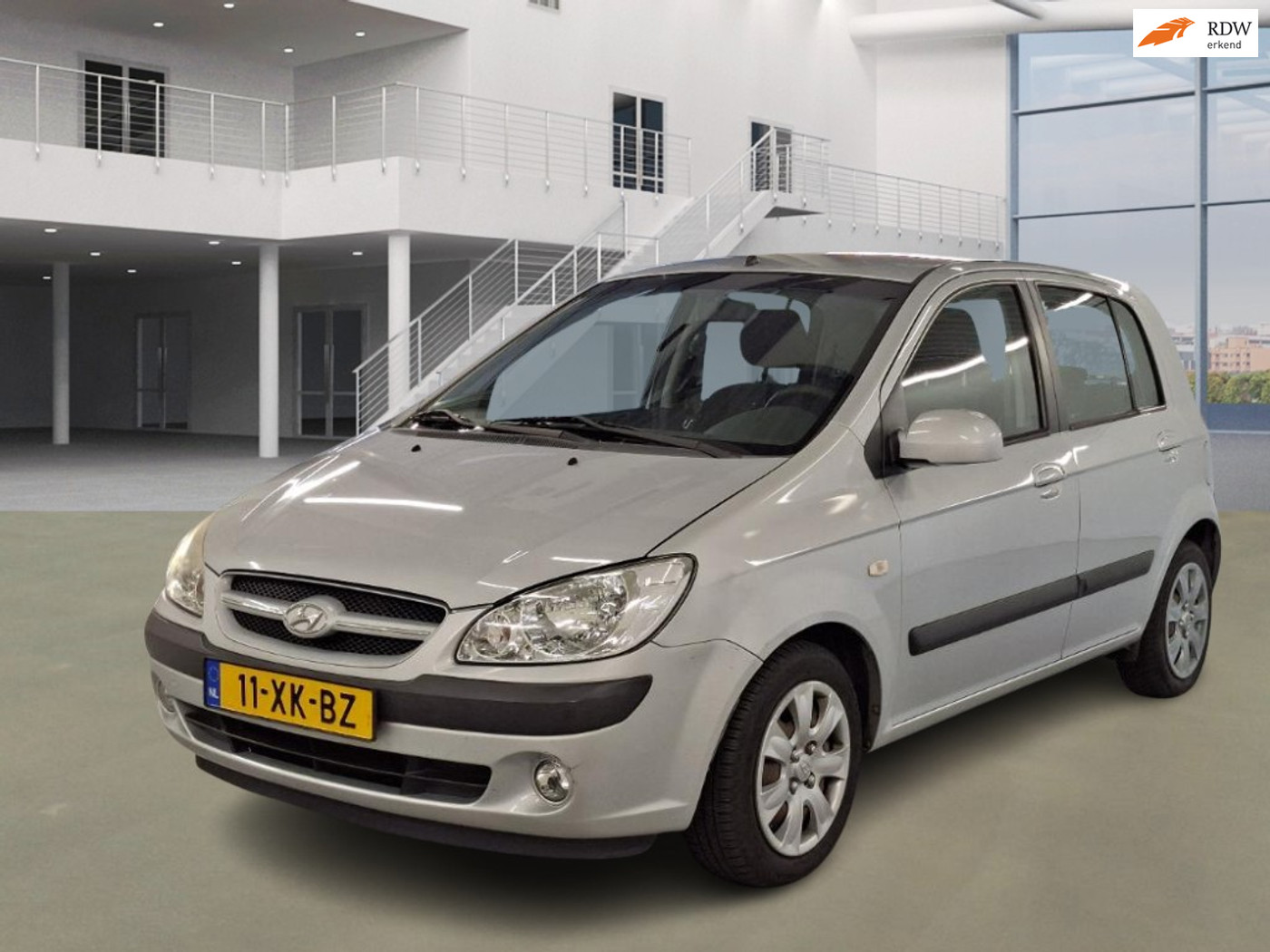 Hyundai Getz 1.4i Active Joy PSENSOR AIRCO 2 X SLEUTELS 2007 - voorkant