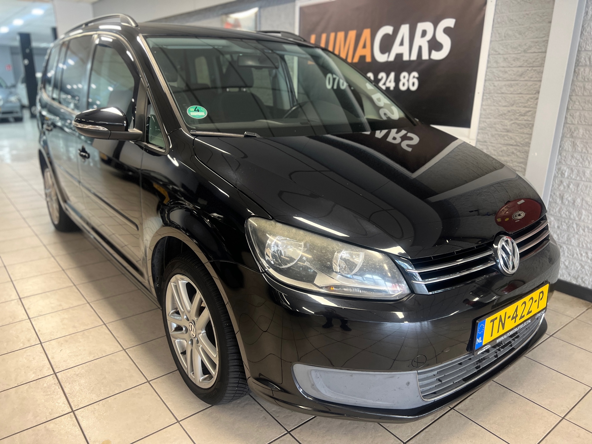 Volkswagen Touran 1.4 TSI Comfortline 7p. | Carplay | NW APK 2010 - voorkant
