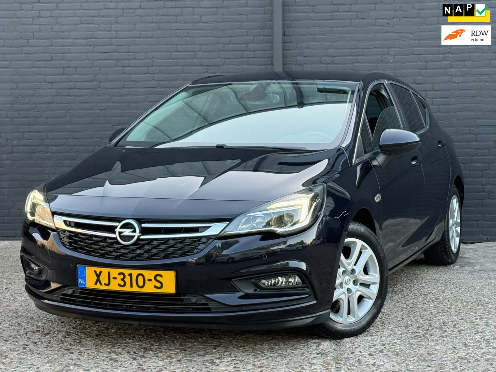 Opel Astra 1.0 Online Edition PDC | NAVI | AIRCO | NWE APK 2019 - voorkant