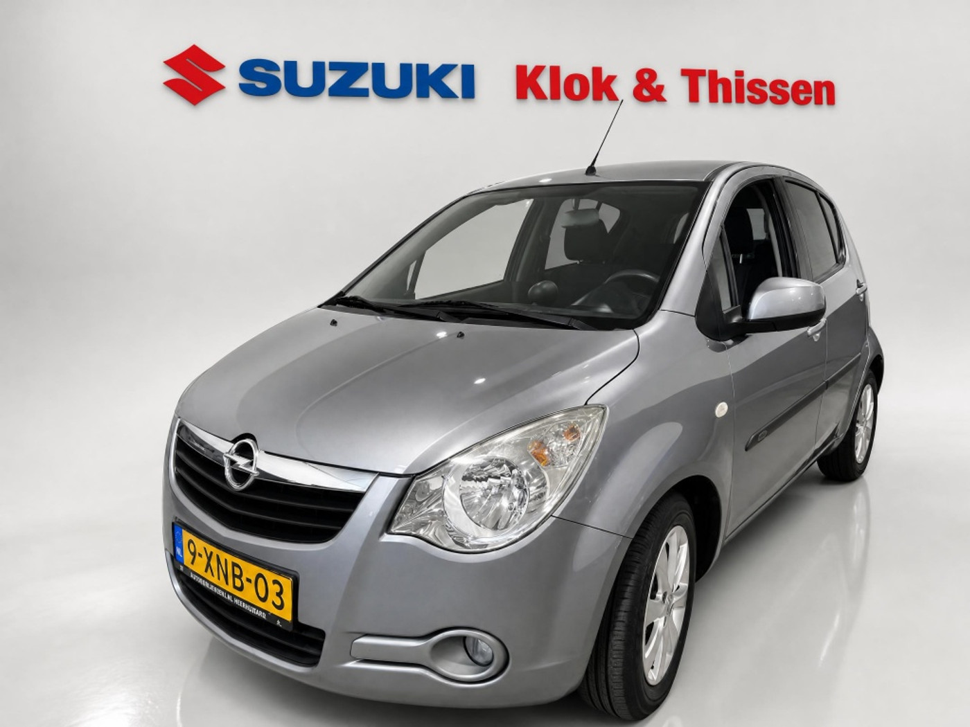 Opel Agila 1.2 Edition Sportvelgen Parkeersensoren Originele radio/CD 2014 - voorkant